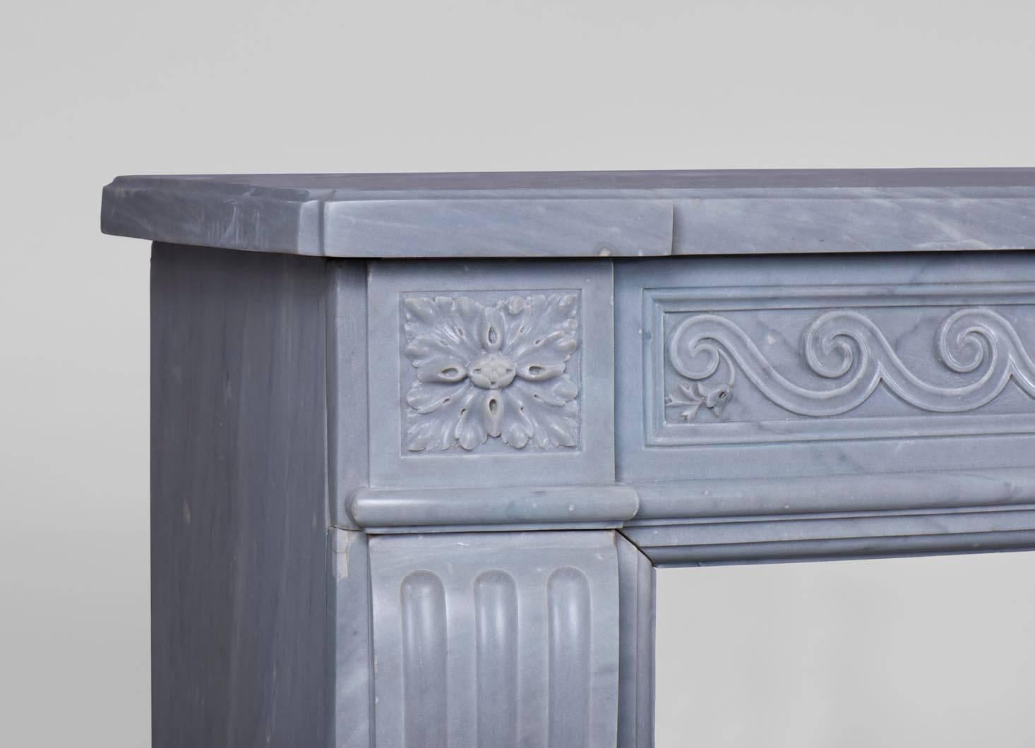 Carved Antique Louis XVI Style Fireplace with Vitruvian Scroll in Blue Turquin Marble For Sale