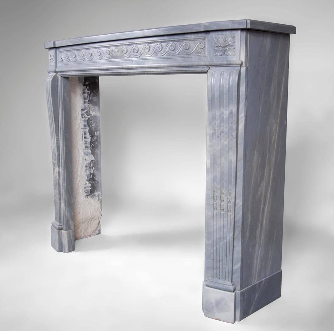 Antique Louis XVI Style Fireplace with Vitruvian Scroll in Blue Turquin Marble In Good Condition For Sale In Saint Ouen, FR