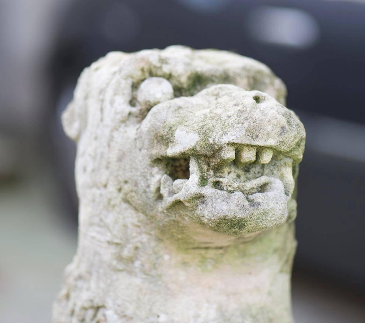 Rare antique stone garden statue depicting a stylized lion, sculpted in the 17th century. Beautiful statue with its aged patina and the true charm of French antique.
 