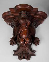 Pair of Applied Consoles in Carved Walnut with Putti Decor, 19th Century