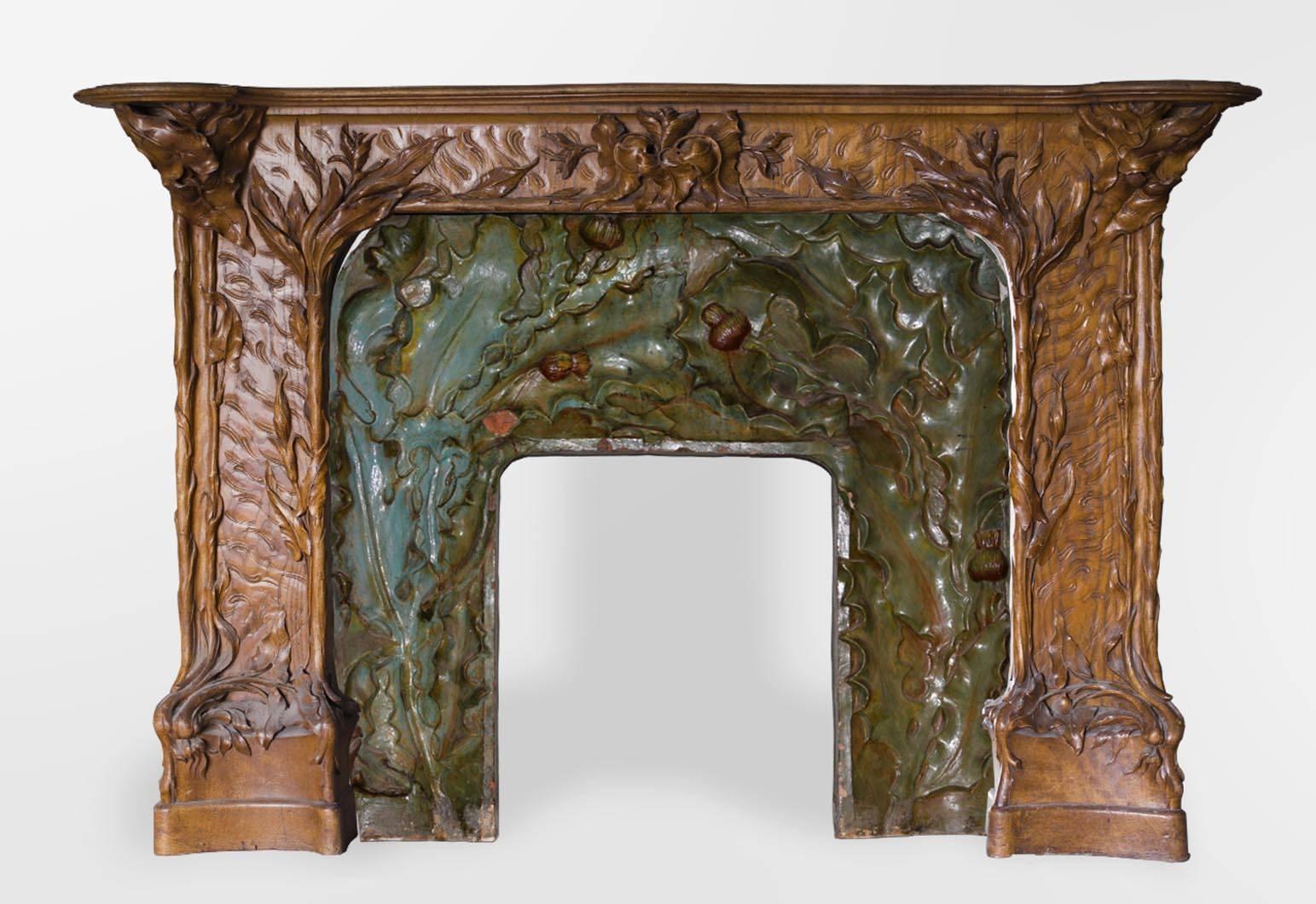 This exceptional Art Nouveau style paneled room is beautifully carved in pine and burr wood and decorated with blue-green ceramics.
The panels cover the bottom of the walls, and harmonize the whole consisting of a fireplace and its monumental