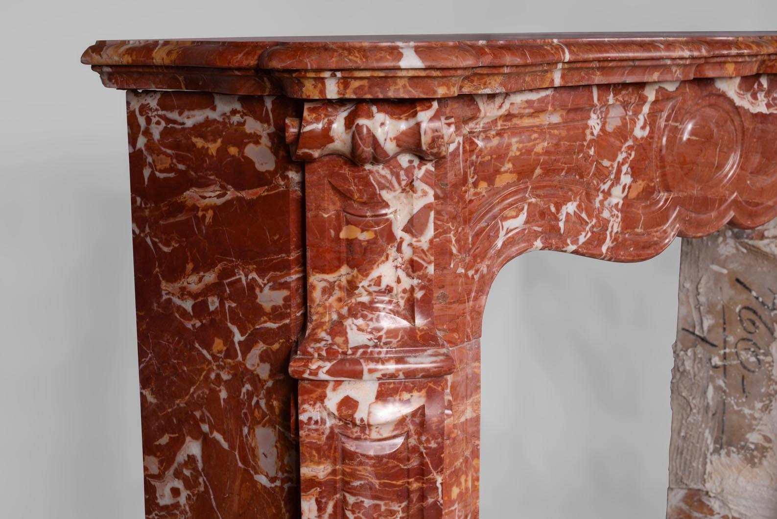 Carved Louis XV Style Fireplace, Pompadour Model, in Saint Maximin Breccia Marble For Sale