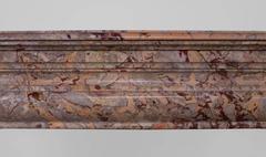 Louis XIV Style "Bollection" Fireplace Mantel in Sarrancolin Ilhet Marble