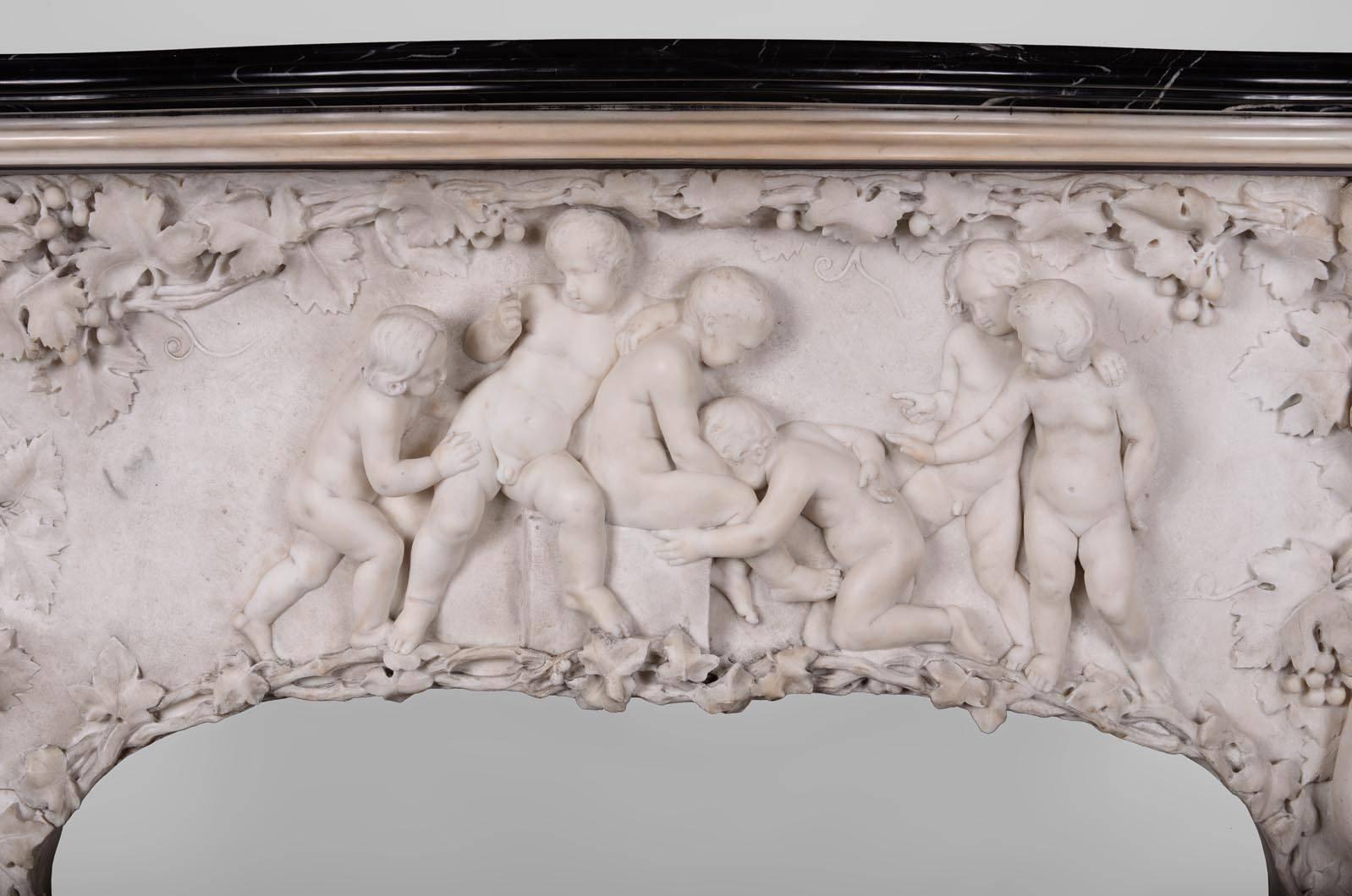 This very rare fireplace sculpted in the late 19th century in Statuary Carrara marble comes from the area of Genoa in Italy. Entirely carved in high relief, this extraordinary piece is undoubtedly the work of a talented sculptor. This mantelpiece is
