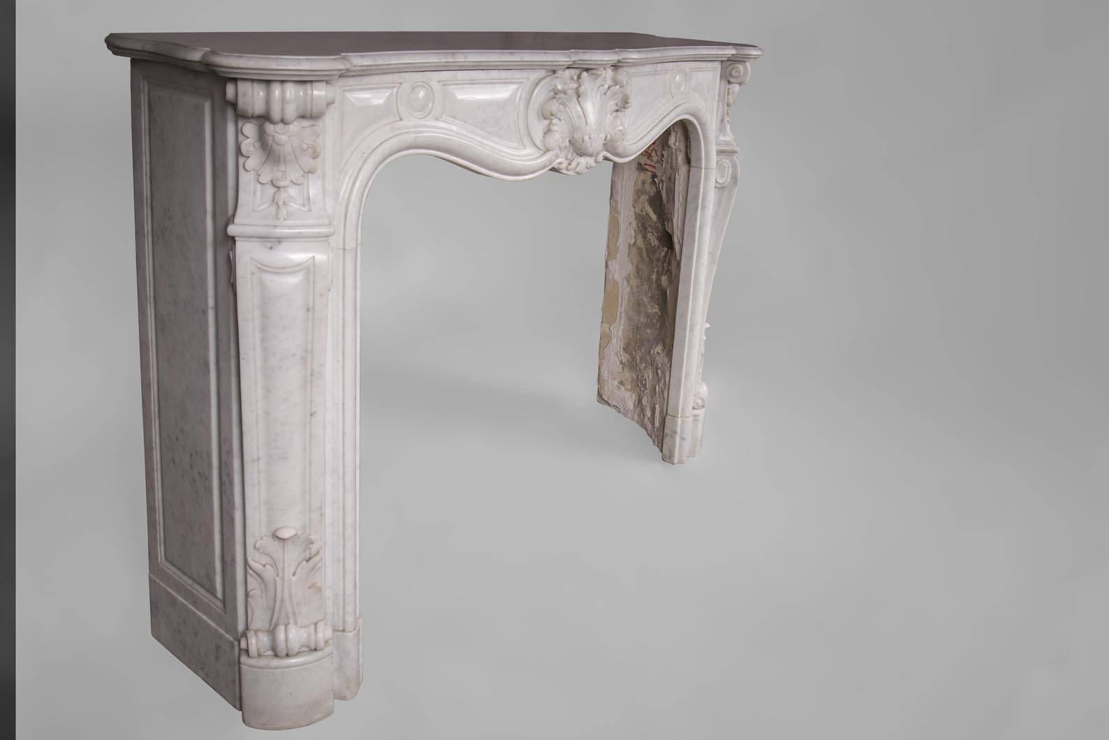 Carved Antique Louis XV Style Fireplace in Carrara Marble with Large Shell For Sale