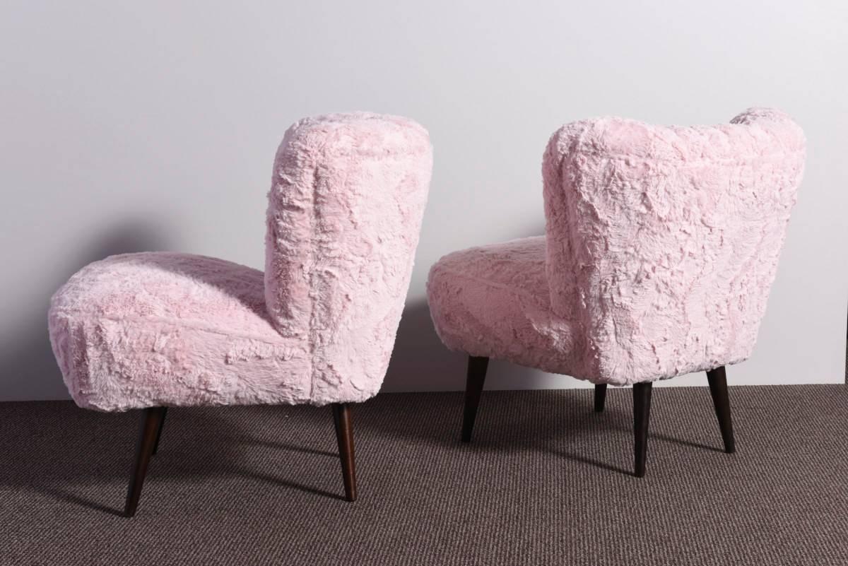 1950s shell back cocktail chairs recovered with a light pink faux fur. Very well constructed, extremely comfortable, fully spring seat with a solid beech inner frame and solid beech legs. An elegant piece with a very glamorous 1950s feel. Stunning