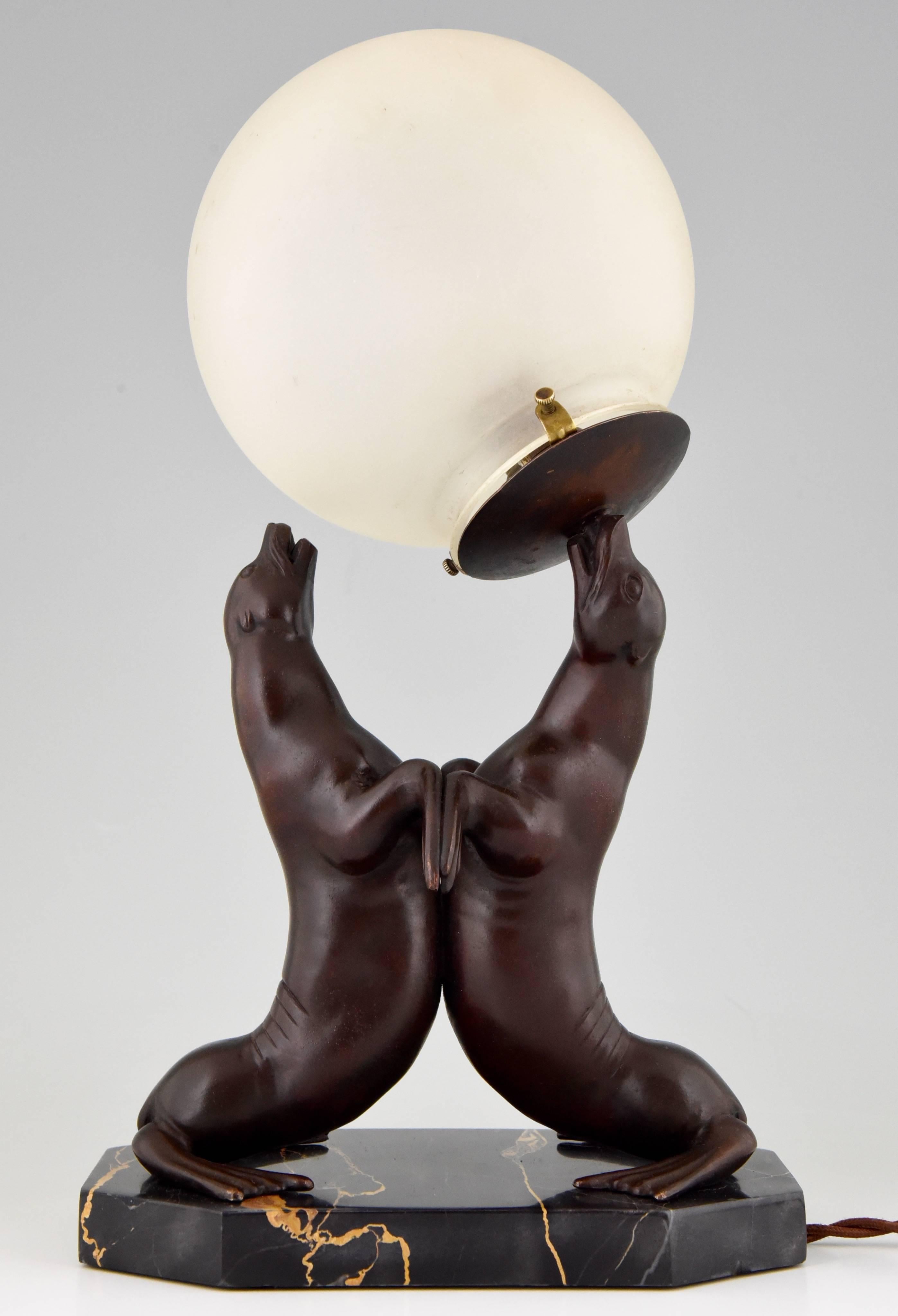 Patinated French Art Deco Seal Lamp with Glass Shade by Carvin, 1930