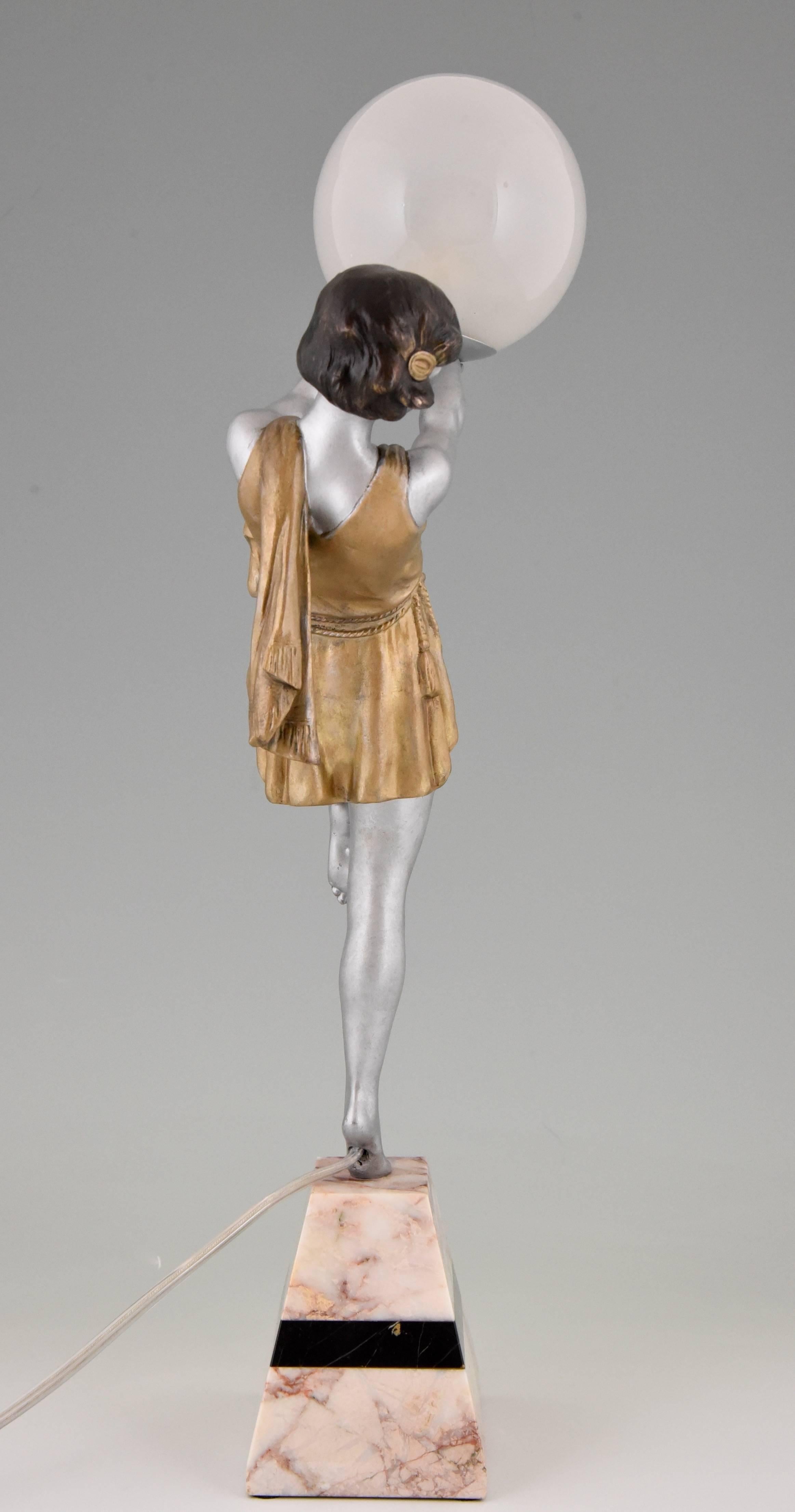 Patinated French Art Deco Lamp Lady Holding a Globe by Carlier, 1930