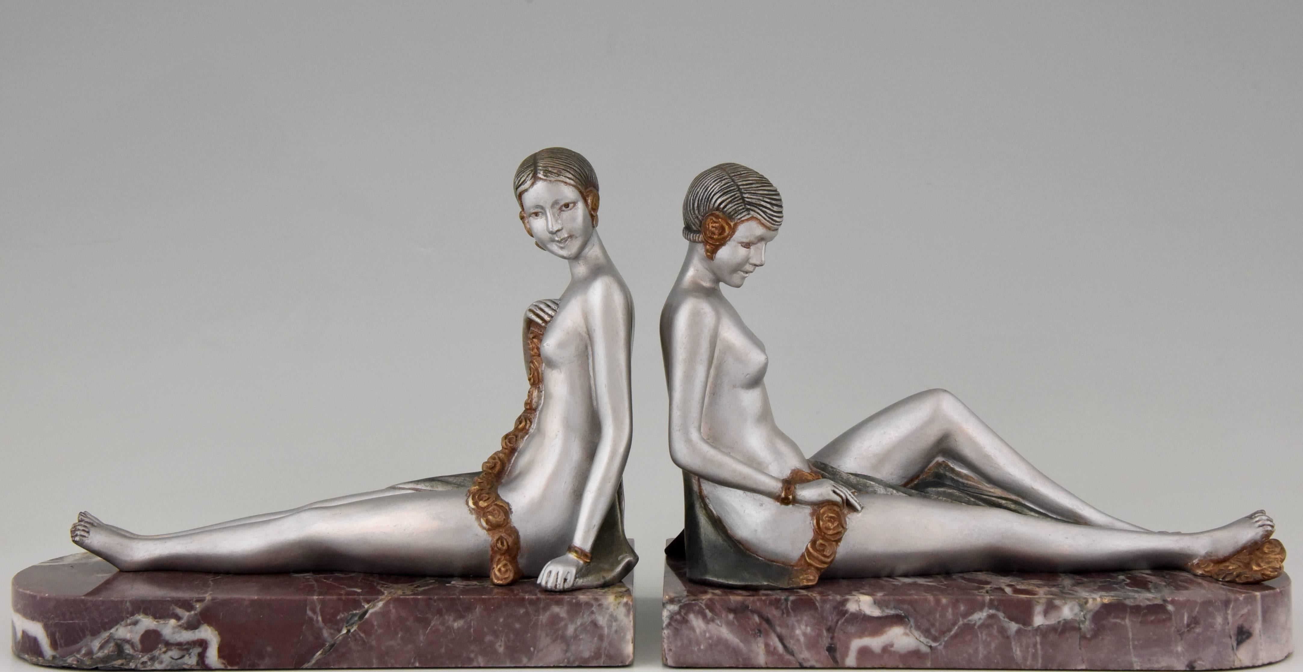 Description: Art Deco bronze nude bookends.
Artist / maker: Scribe.
Signature / marks: Scribe.
Style: Art Deco.
Date: circa 1925-1930.
Material: Bronze with multicolor patina. Marble base.
Origin: France.
Size of one:
H. 6.9 inch x L. 8.5