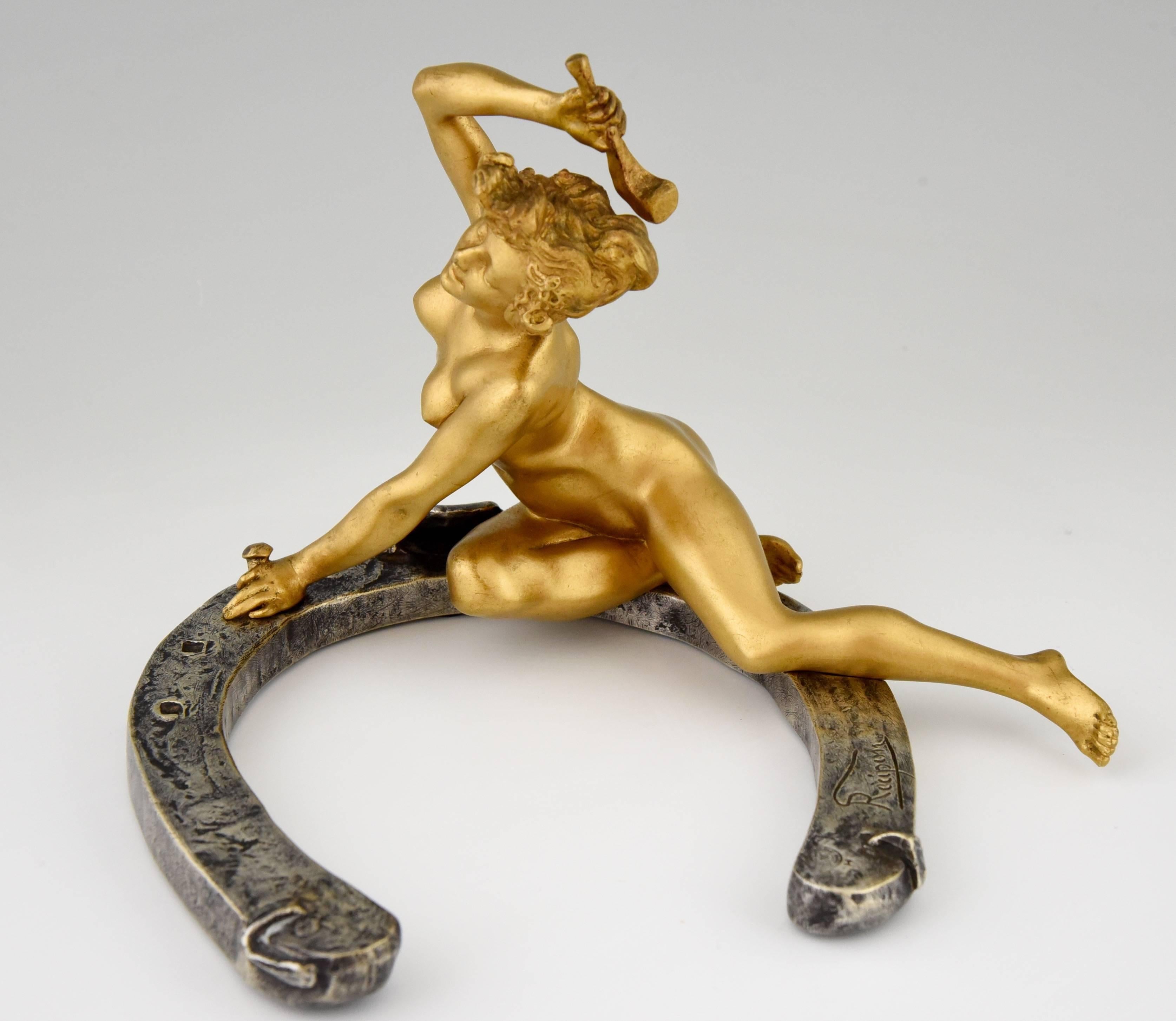 Very special Art Nouveau bronze nude on a horseshoe by the French artist Georges Récipon, this work is illustrated in several books.

Artist / maker:
Georges Récipon.
Signature / marks:
Récipon. Susse Frères Foundry ed. Paris.
Style:
Art