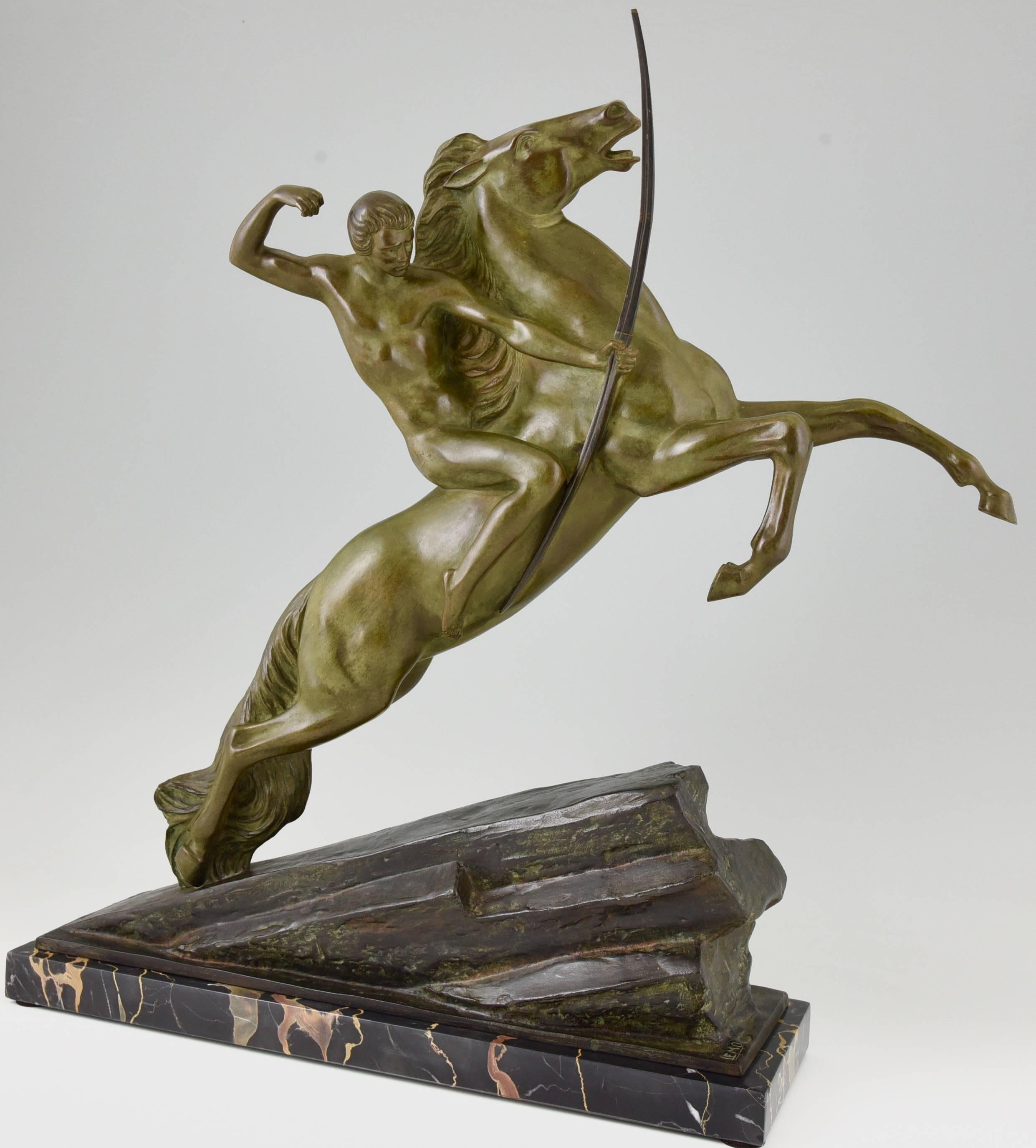 Impressive Art Deco bronze sculpture of an archer with bow on a rearing horse signed by the French artist Armand Lemo.

Artist / maker:
Armand Lemo.
Signature / marks:
Lemo. Foundry mark.
Style:
Art Deco.
Date:
1925.
Material:
Patinated