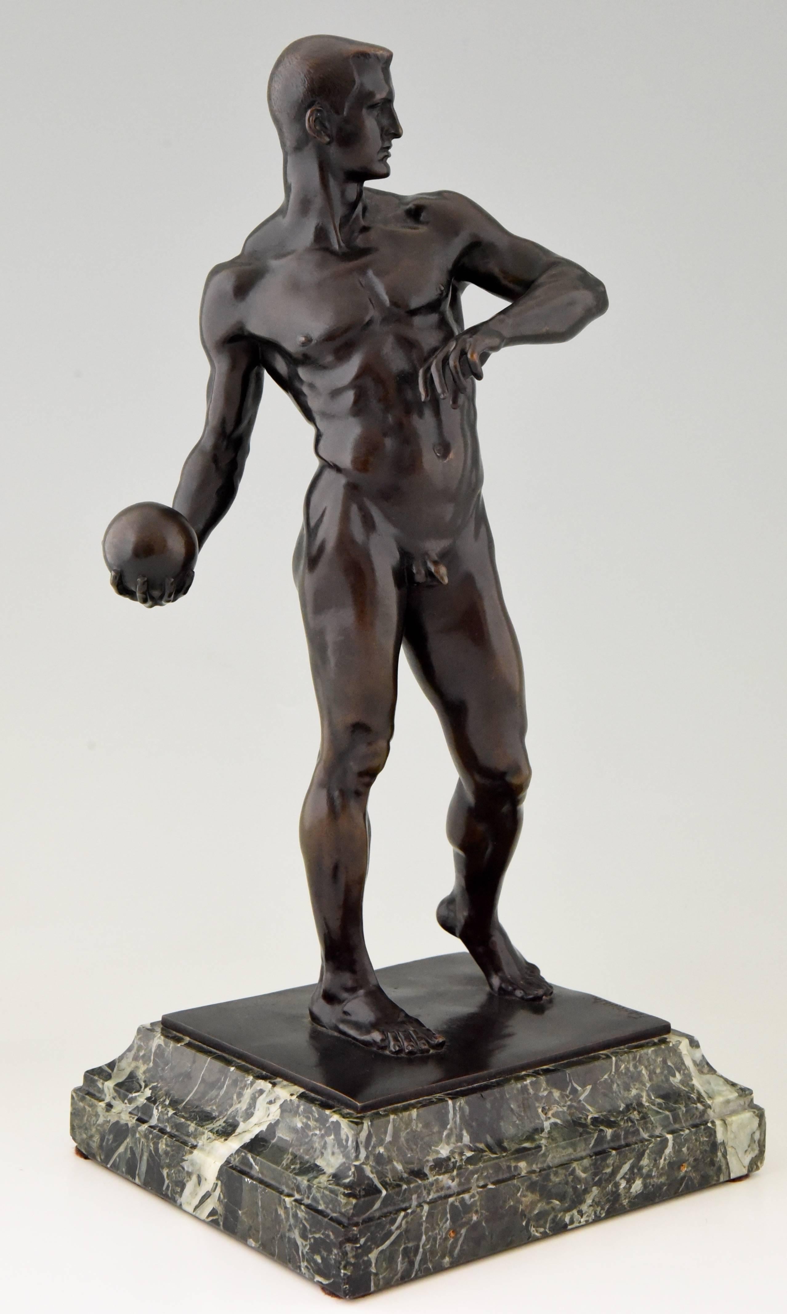 Antique bronze sculpture of an athletic male nude holding a ball.
A 4.5 meter version of this figure designed in 1907 stands outside the Hygiene Museum of Wilhelm Kreis in Dresden.
Artist/ maker: Richard Wilhelm Daniel Fabricius, German,