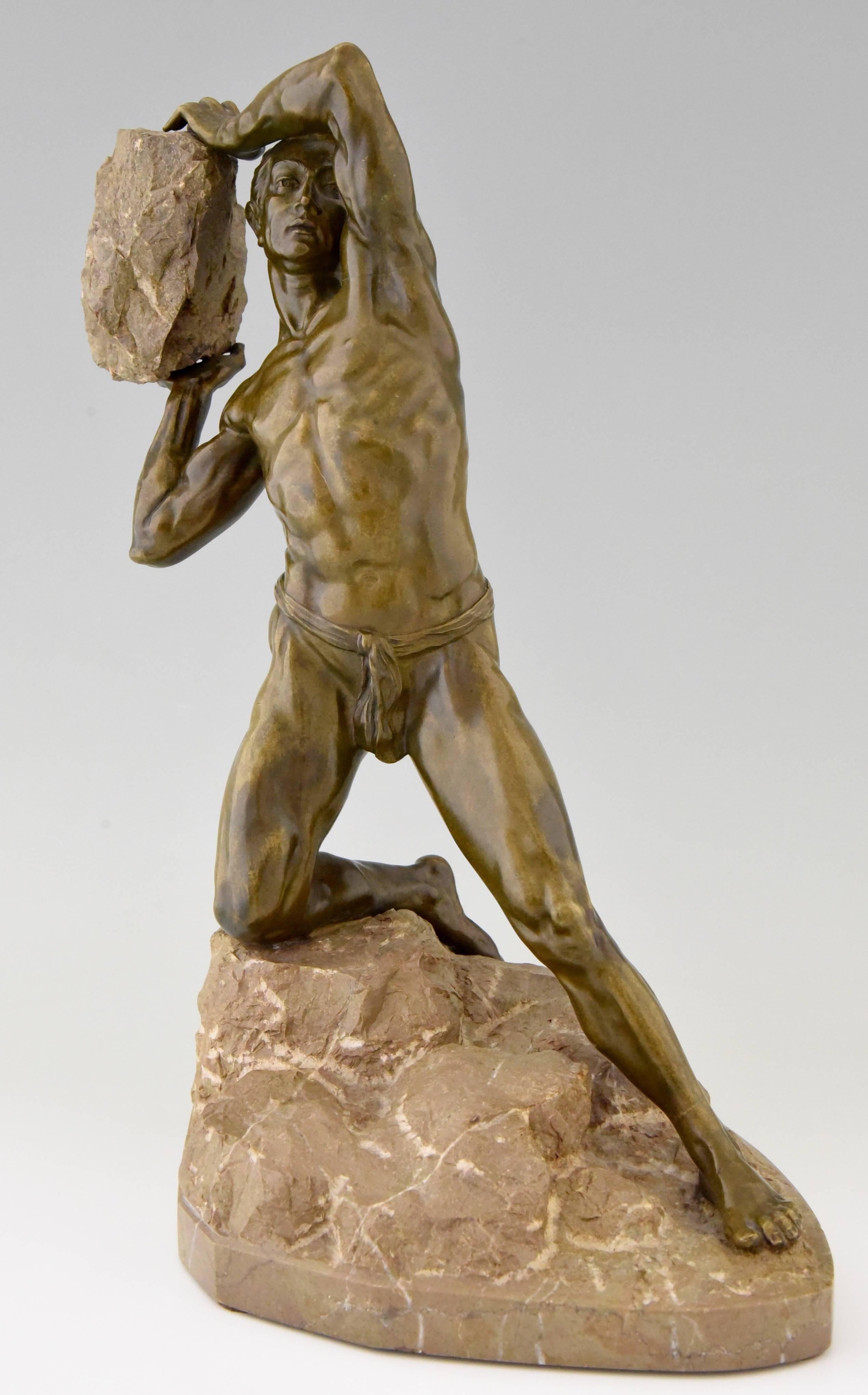 Antique bronze sculpture male nude with rock.

Date:
1900.
Material:
Bronze and marble.
Origin:
Europe.
Size cm:
Measures: H. 43 cm. x L. 32 cm. x W. 32 cm. 
Size inch:
H. 16.9 inch x L. 12.6 inch x W. 8.7 inch.
Condition:
Very good