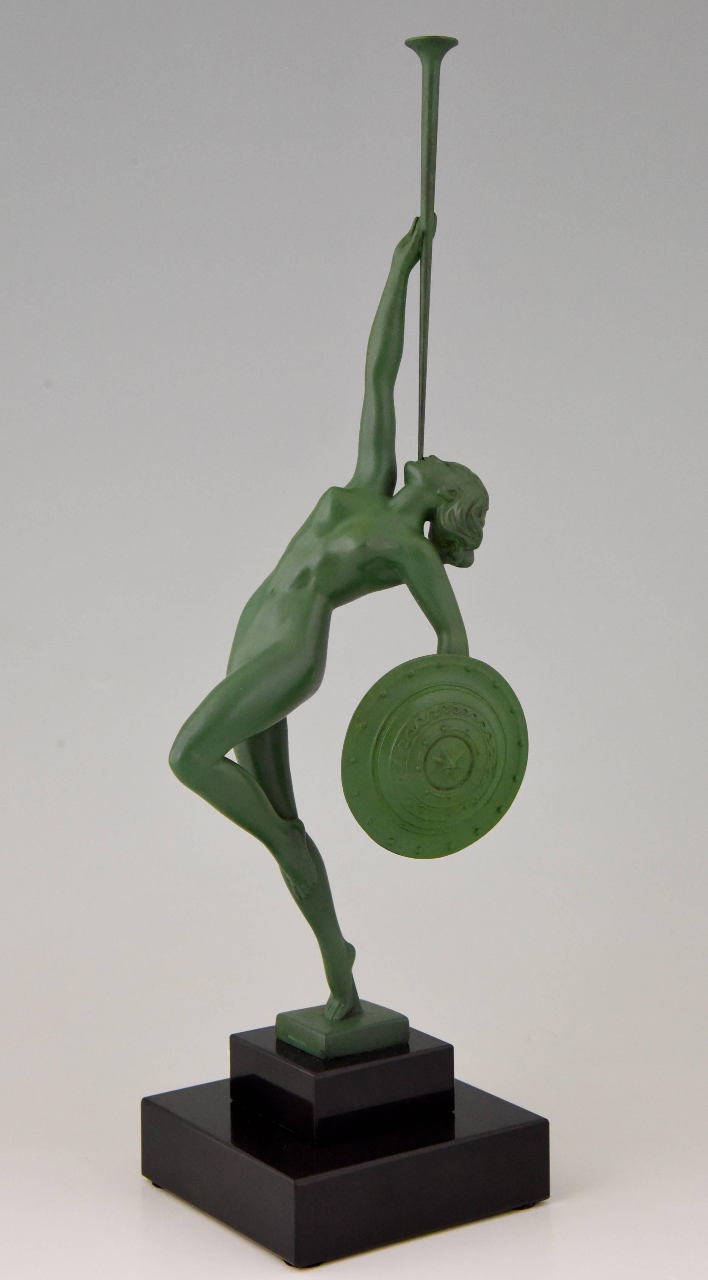 Jericho, elegant Art Deco sculpture of a nude with shield and trumpet by Raymond Guerbe, the wife of Pierre Le Faguays. 

Artist / maker:
Guerbe.
Signature / marks:
Guerbe.
Style:
Art Deco.
Date:
1930.
Material:
Metal with green patina