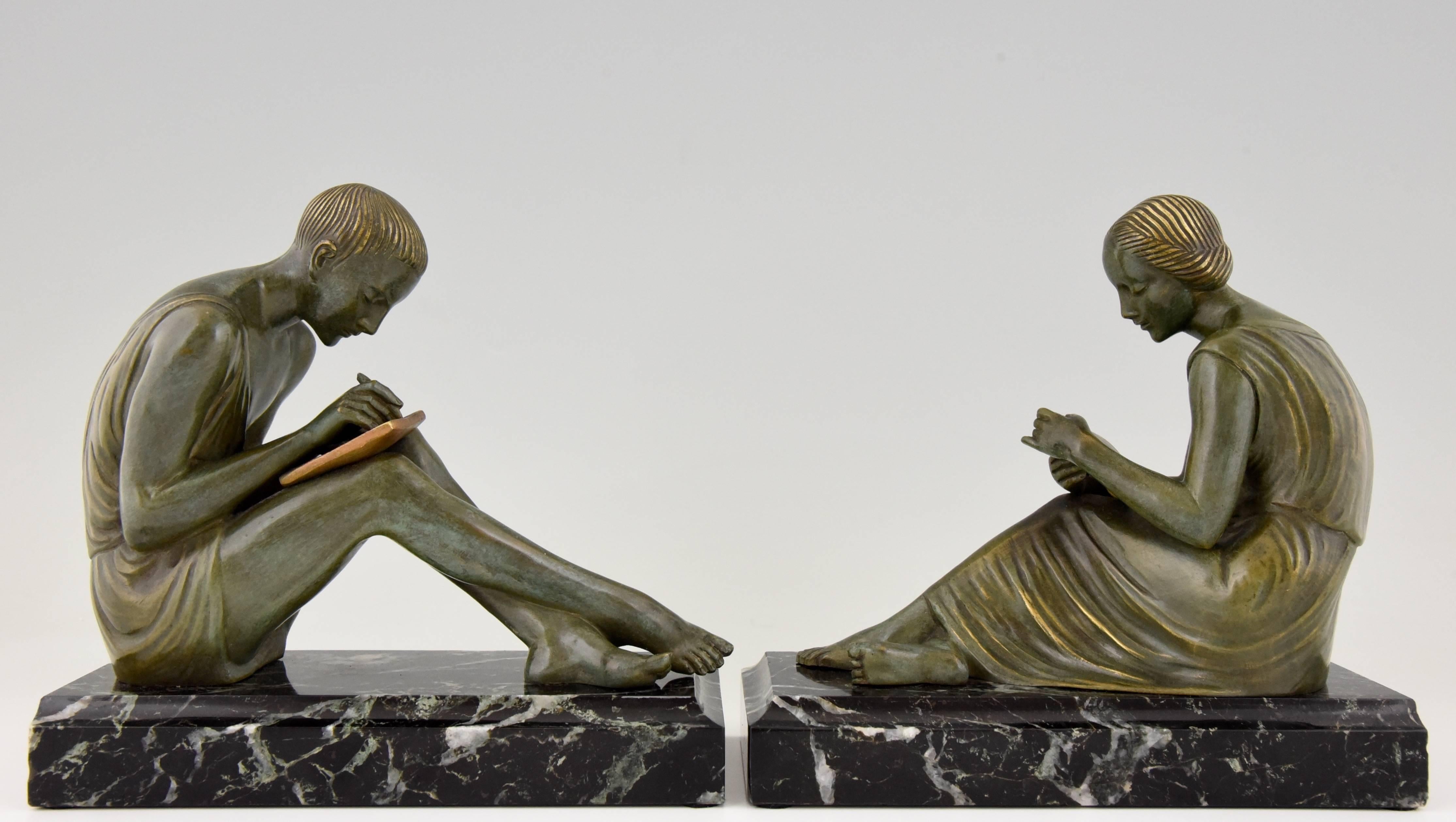 Patinated French Art Deco Bronze Bookends Man Writing Lady Reading Pierre Le Faguays, 1930