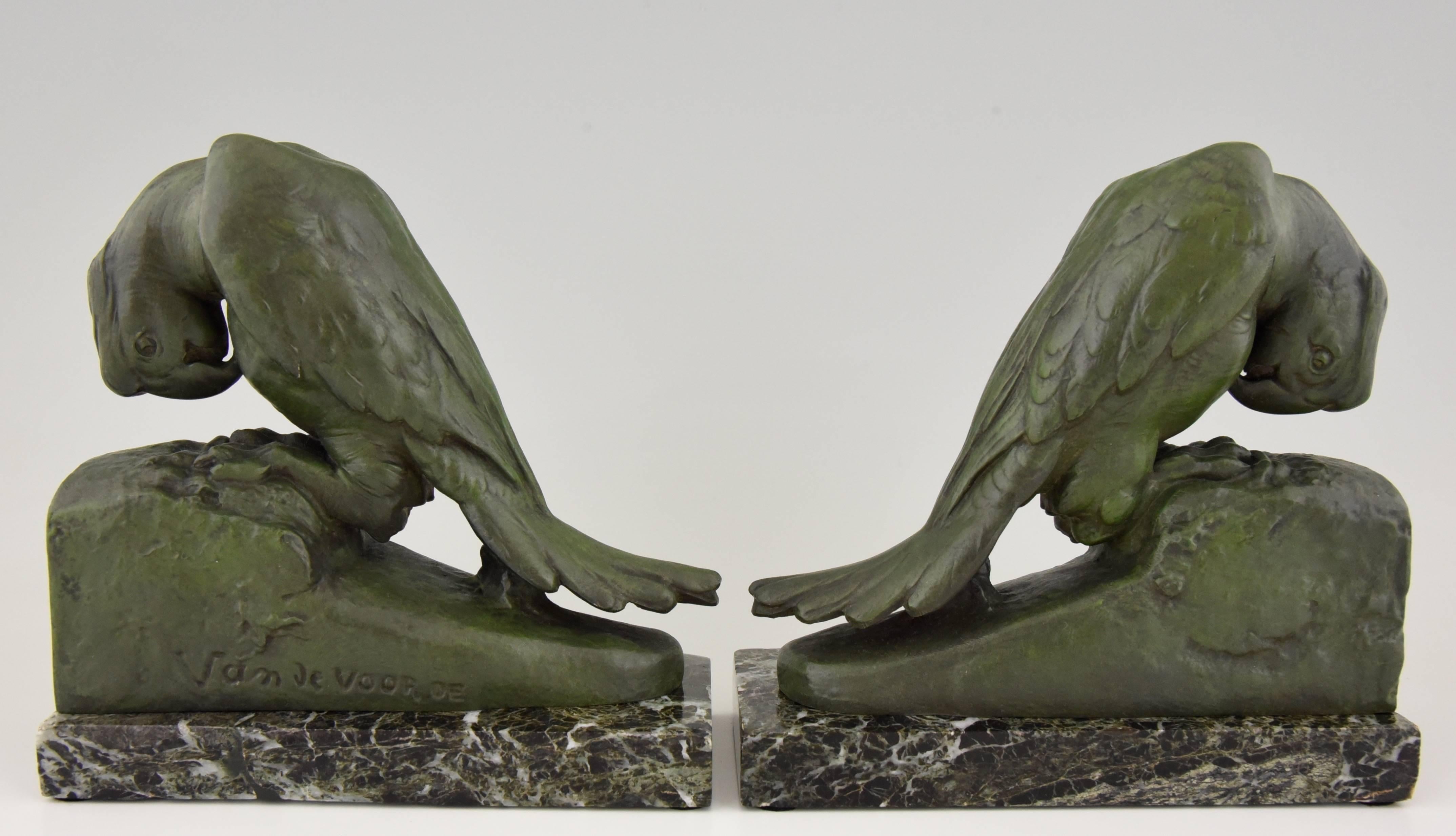 Lovely pair of Art Deco parrot bookends by the Belgian artist Georges Van De Voorde, born in 1878, who worked in Paris, France.

Artist / Maker:
Georges Van De Voorde.
Signature / Marks:
Van de Voorde.  Foundry seal Brig, Paris, France.