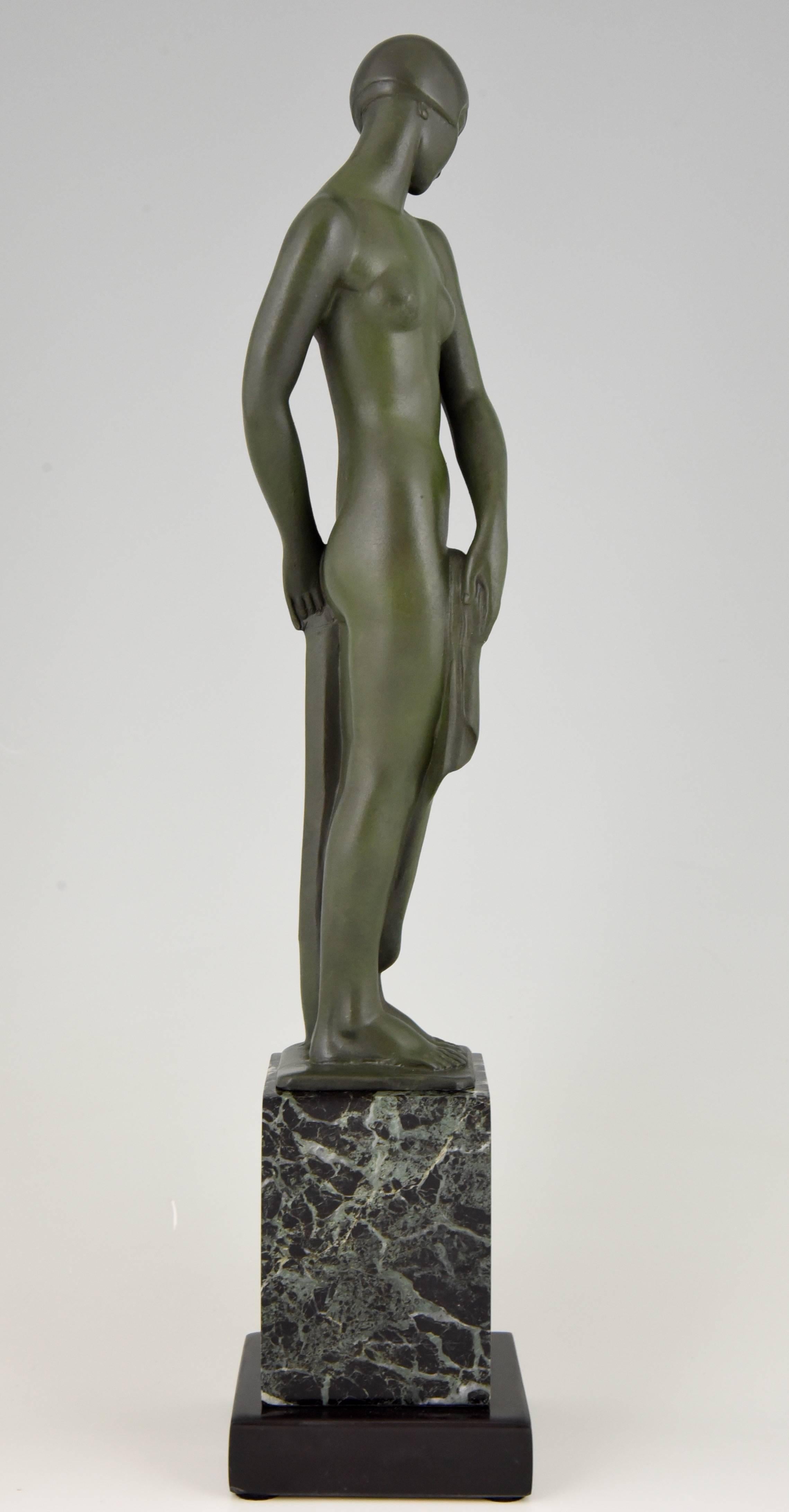 Art Deco sculpture of a nude.

Artist/ maker:
Fayral, Le Faguays.
Signature / marks:
Fayral.
Style:
Art Deco.
Date:
1930.
Material:
Metal with green patina.  Marble base. 
Origin:
France.
Size cm:
H. 38 cm x L. 8 cm. x W. 7.5