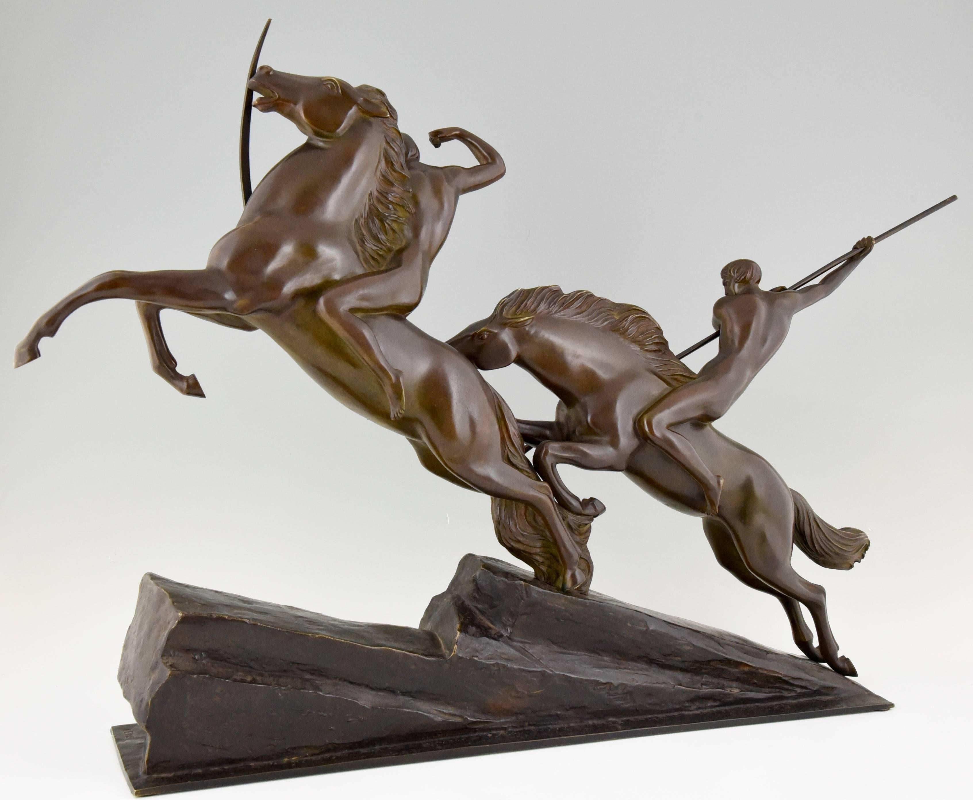 Patinated Large French Art Deco Bronze Group Archers on Horses by Armand Lemo, 1930