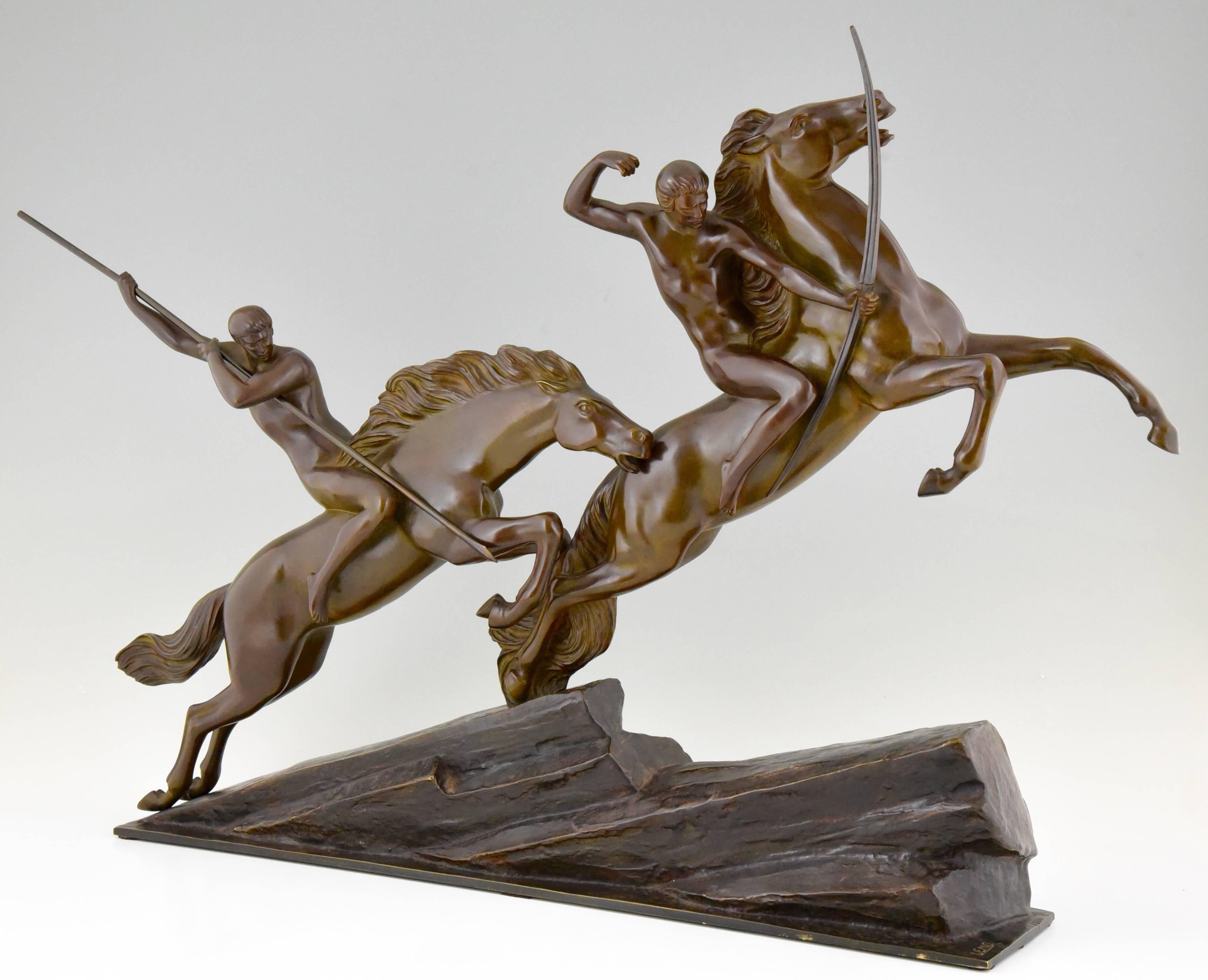 Impressive Art Deco bronze sculpture of two archers with bow and spear on a rearing horses.

Artist/maker: Armand Lemo.
Signature/marks: Lemo, stamped number.
Style: Art Deco.
Date: 1925.
Material: Bronze.
Origin: France.
Size: H 60 cm x L