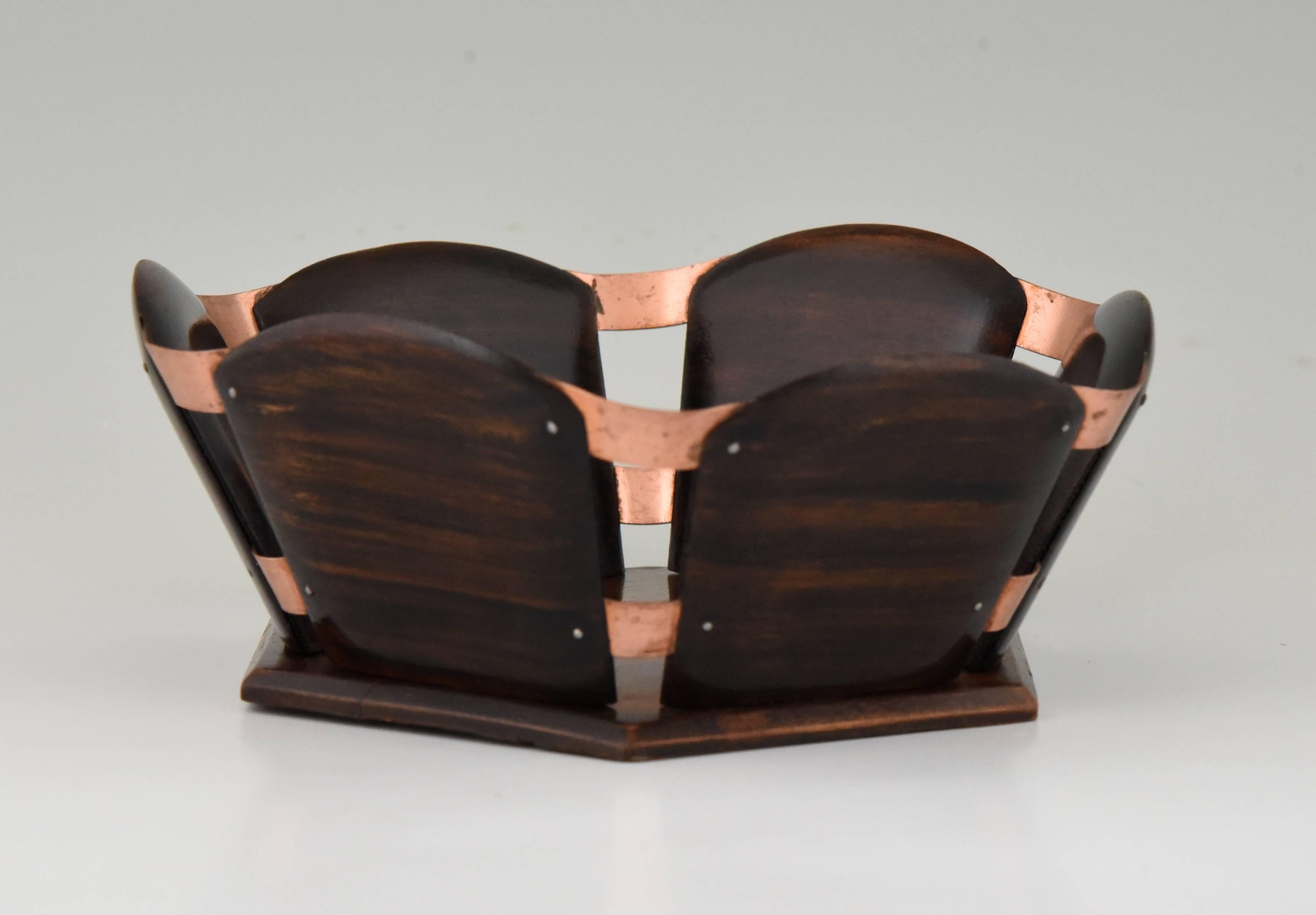 Signature/ Marks: Original label from a decorator in Paris
Style: Art Deco
Date: 1930
Material: Wood and copper.
Origin: France
Size: H. 8 cm x L. 20.5 cm. x W. 19.5 cm.  
H. 3.2 inch x L. 8 inch x W. 7.7 inch.
Condition: Very good condition.
