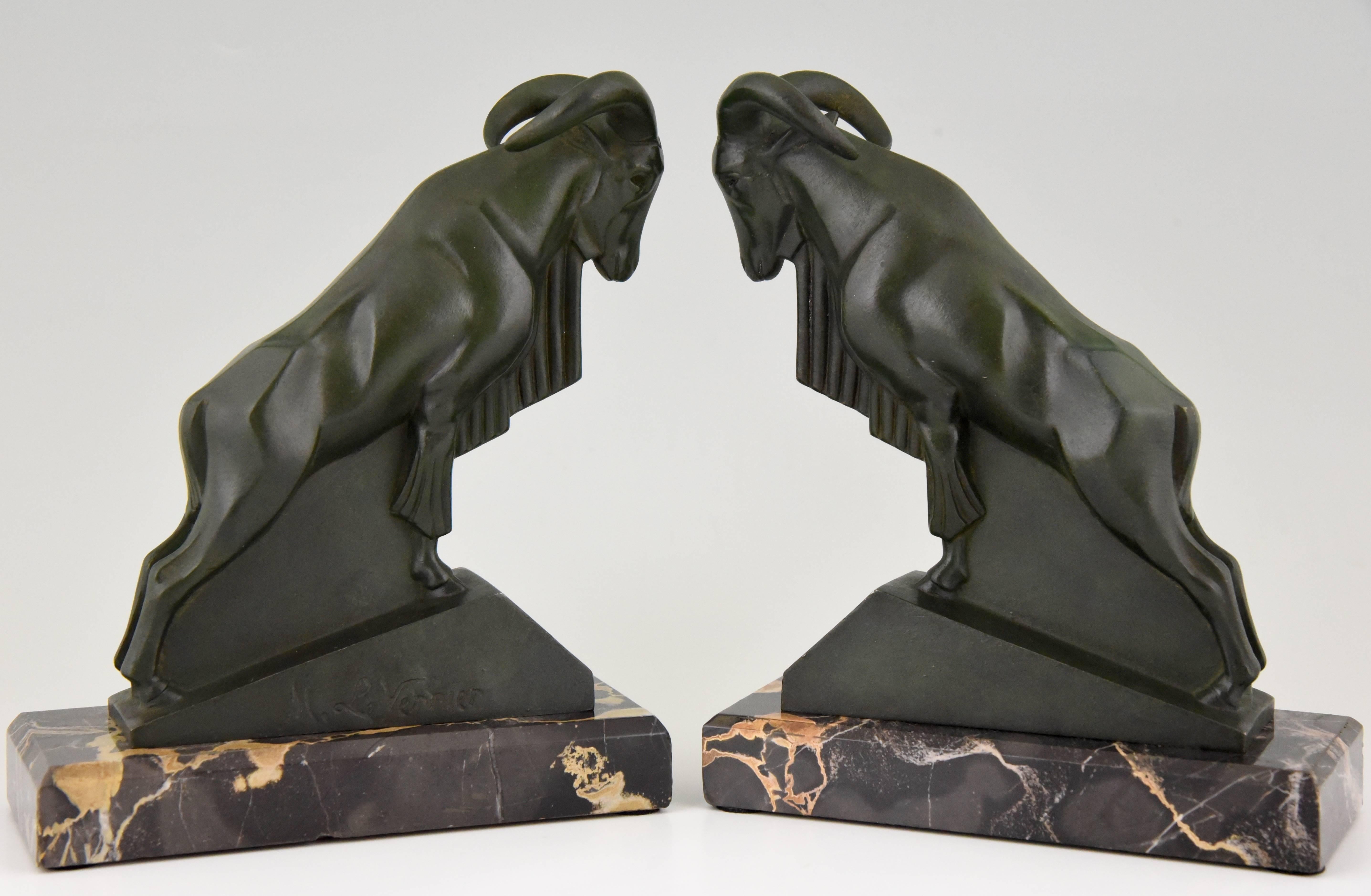 Beautiful pair of Art Deco bookends in the shape of rams by the French artist Max Le Verrier.

Signature/ Marks: M. Le Verrier.
Style: Art Deco
Date: 1930
Material: Green patinated art metal. Portor marble bases.
Origin: France
Size: H. 16.5