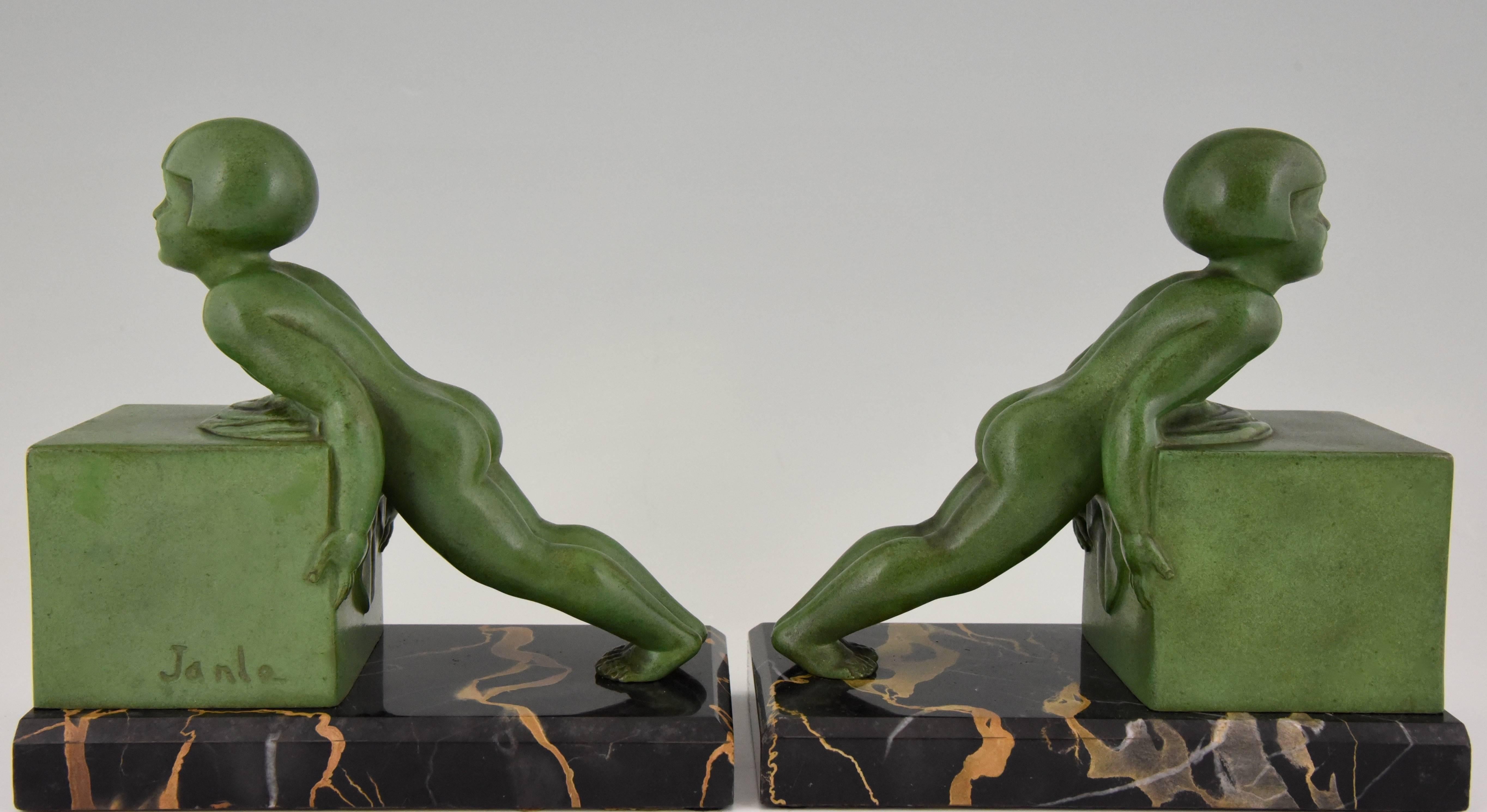 Patinated Pair of French Art Deco Child Bookends by Janle, 1930