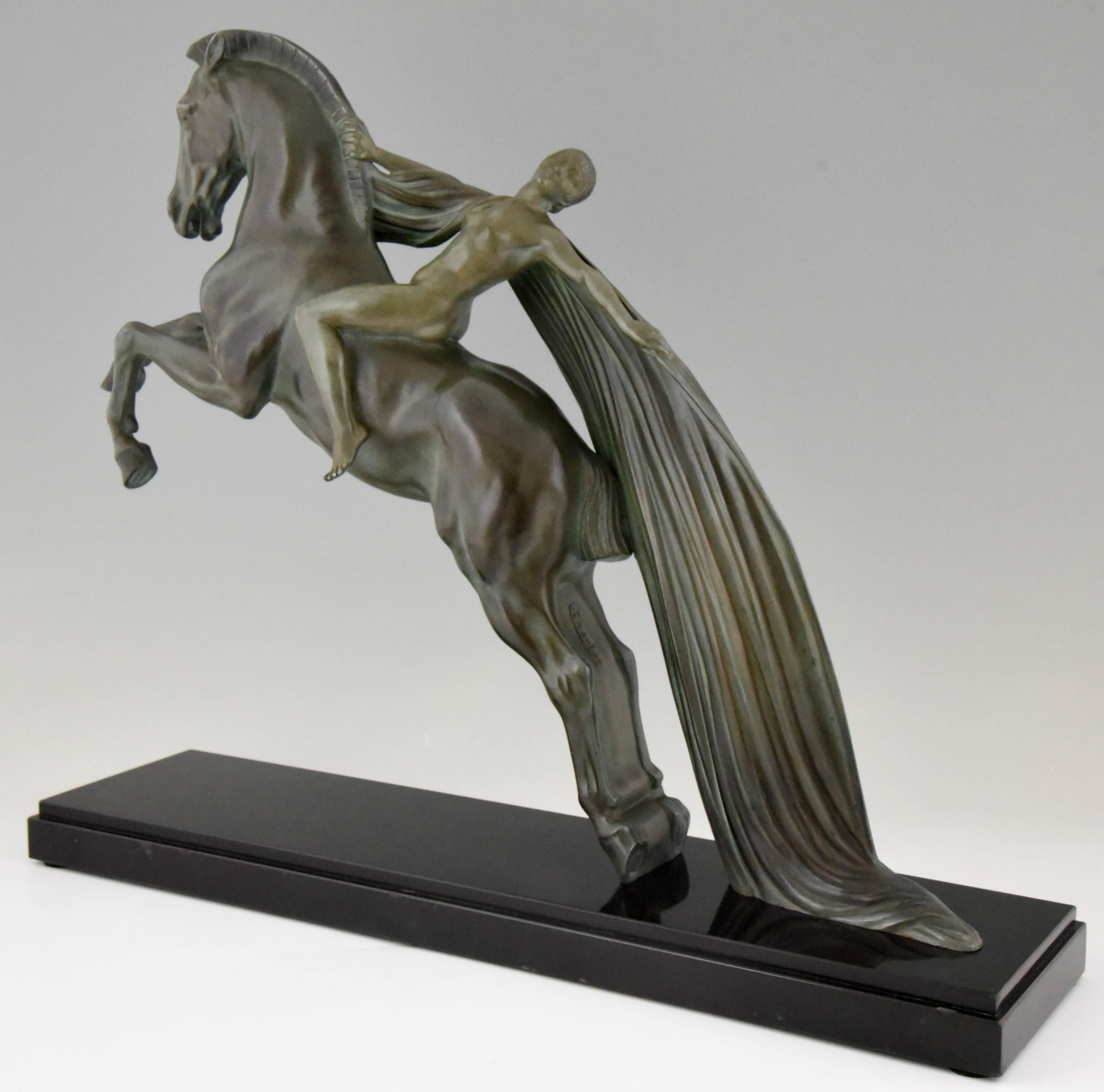 Spectacular Art Deco sculpture of a nude on a rearing horse by the French artist C. Charles cast by Max Le Verrier. 

Signature/ Marks: C. Charles.
Style: Art Deco.
Date: circa 1930.
Material: Art metal with green patina on black marble