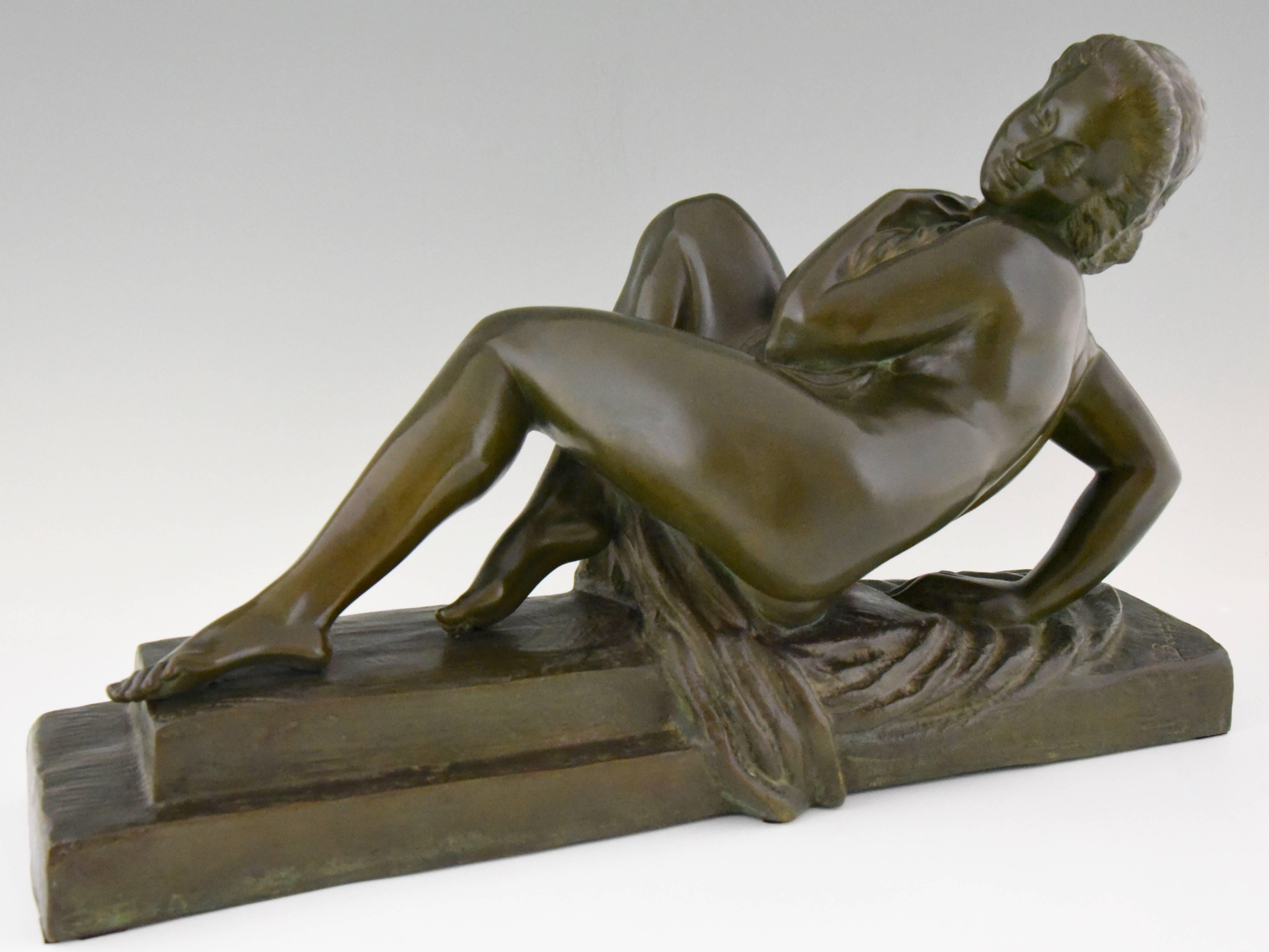 Hard to find bronze Art Deco sculpture of a bathing nude with drape by the famous French artist Marcel Andre Bouraine, 1886-1948. 

Artist/ maker: Marcel Bouraine
Signature/ marks: Bouraine.
Style: Art Deco
Date: 1930
Material: Bronze with