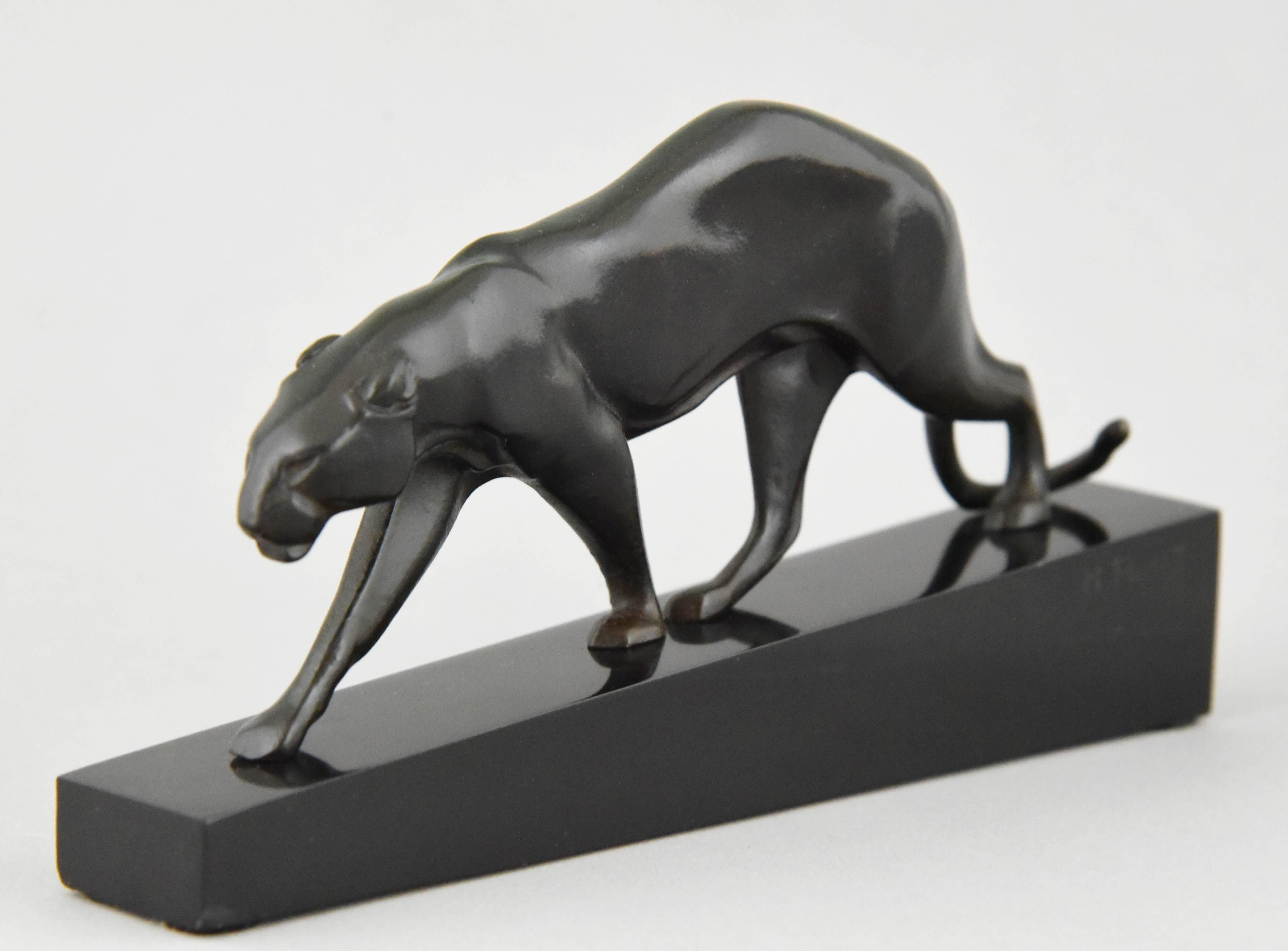 Typical Art Deco bronze sculpture of a walking panther by the famous artist Maurice Prost. 

Artist/ maker: Maurice Prost.
Signature/ marks: M. Prost. Susse Frères éd. Paris. Founders signature.
Style: Art Deco
Date: 1925
Material: Patinated