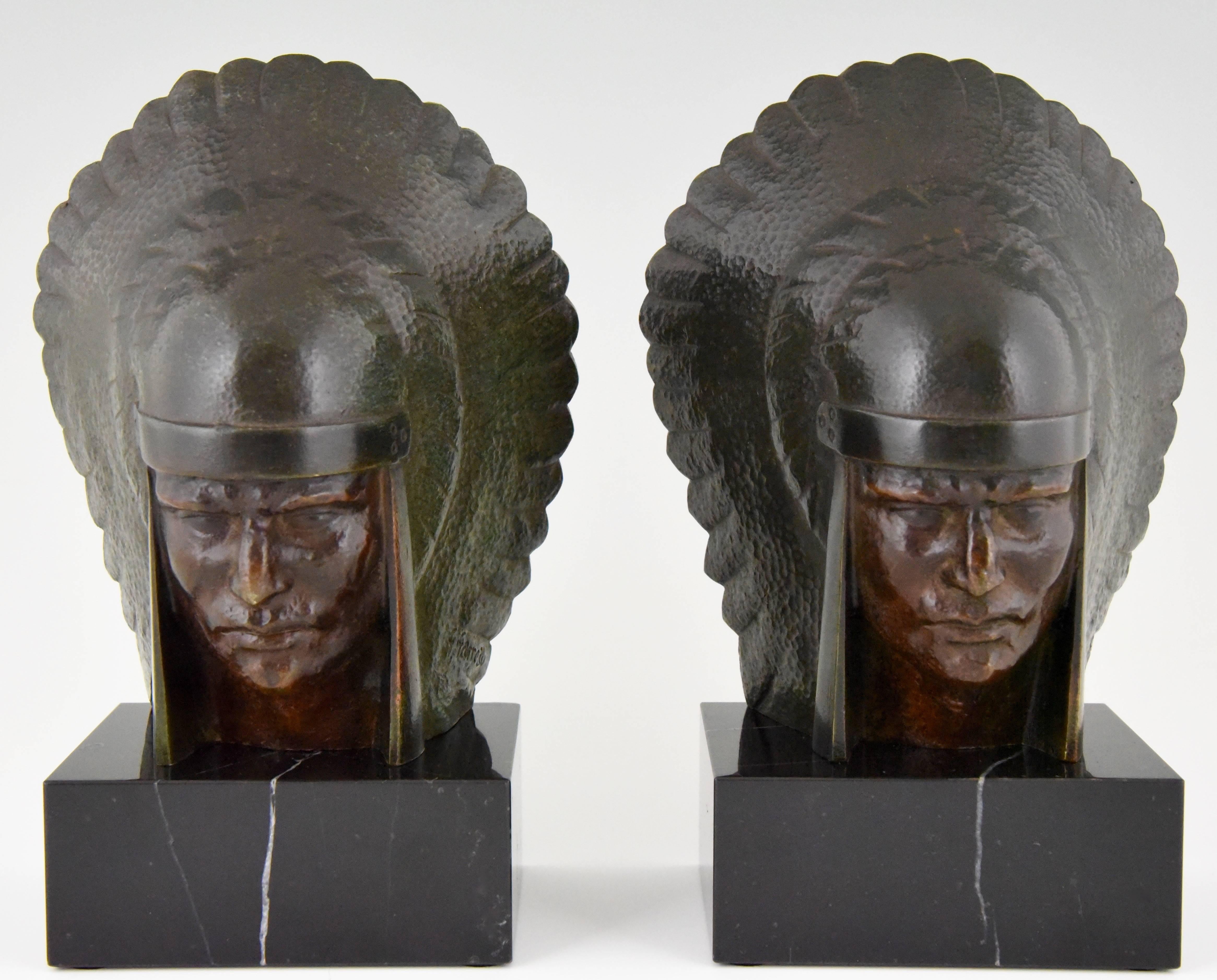 Beautiful pair of Art Deco bronze bookends by the French artist Georges Garreau. 

Signature/ Marks: G. Garreau.
Style: Art Deco
Date: 1930
Material: Multi color patinated bronze. Black marble base.
Origin: France
Size: H. 19.5 cm x L. 13 cm.