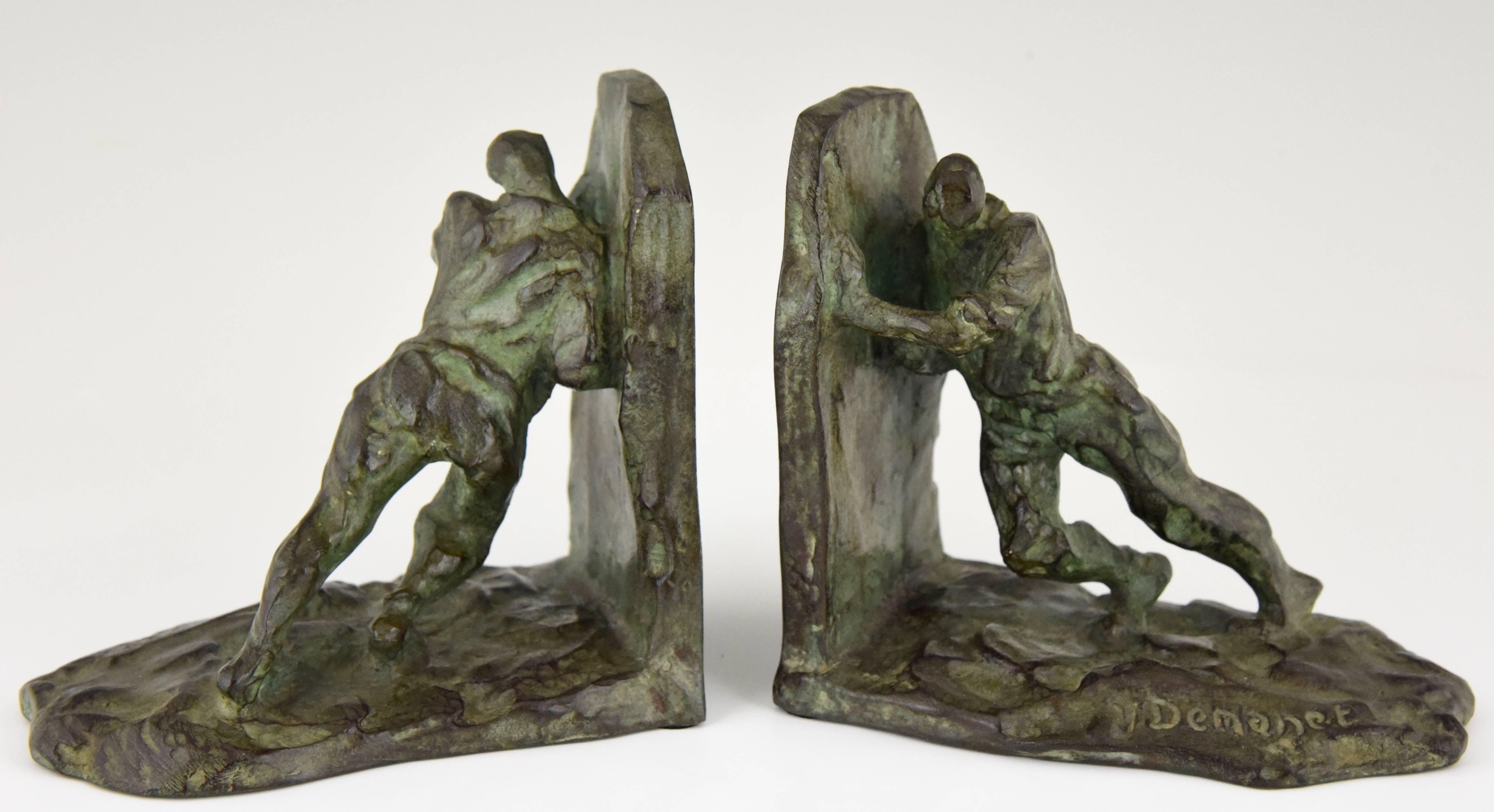Powerful Art Deco bronze bookends with pushing men by Victor Demanet

Artist/ maker: Victor Demanet
Signature/ marks: V. Demanet. Bronze, France.
Style: Art Deco
Date: 1930
Material: Bronze with dark green patina.
Origin: French artist,