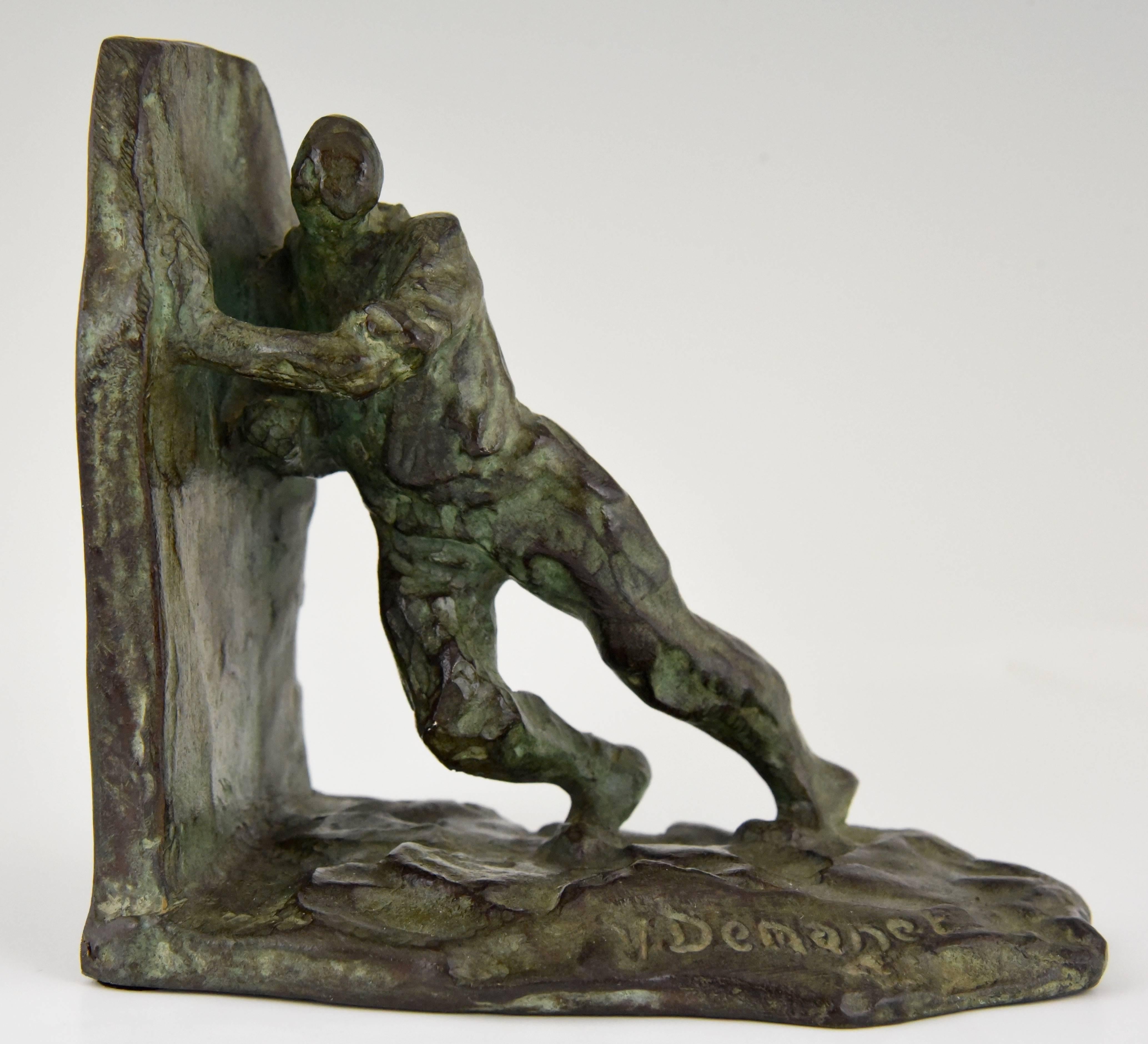 20th Century Art Deco bronze bookends pushing men Victor Demanet, 1930