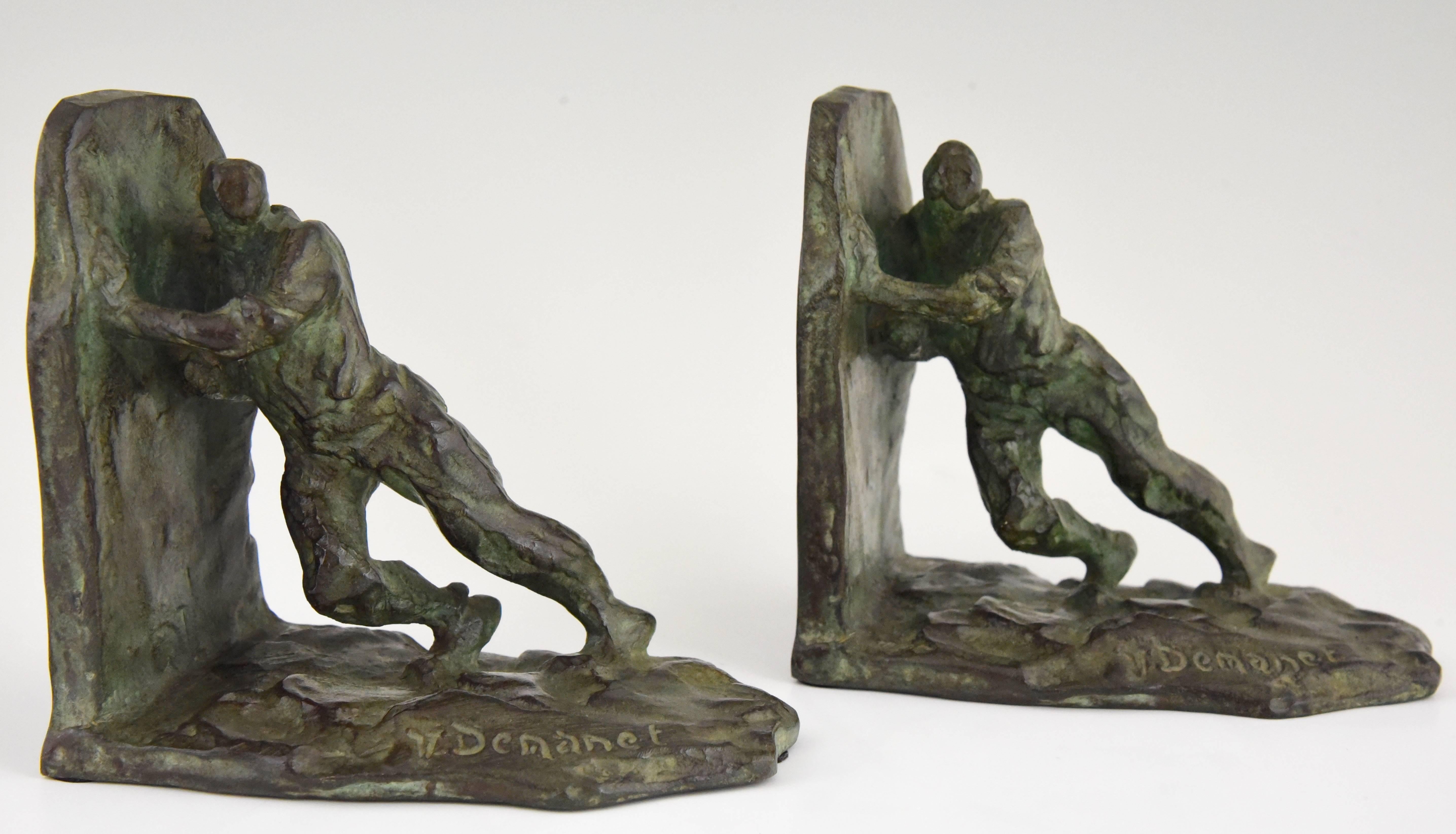 French Art Deco bronze bookends pushing men Victor Demanet, 1930