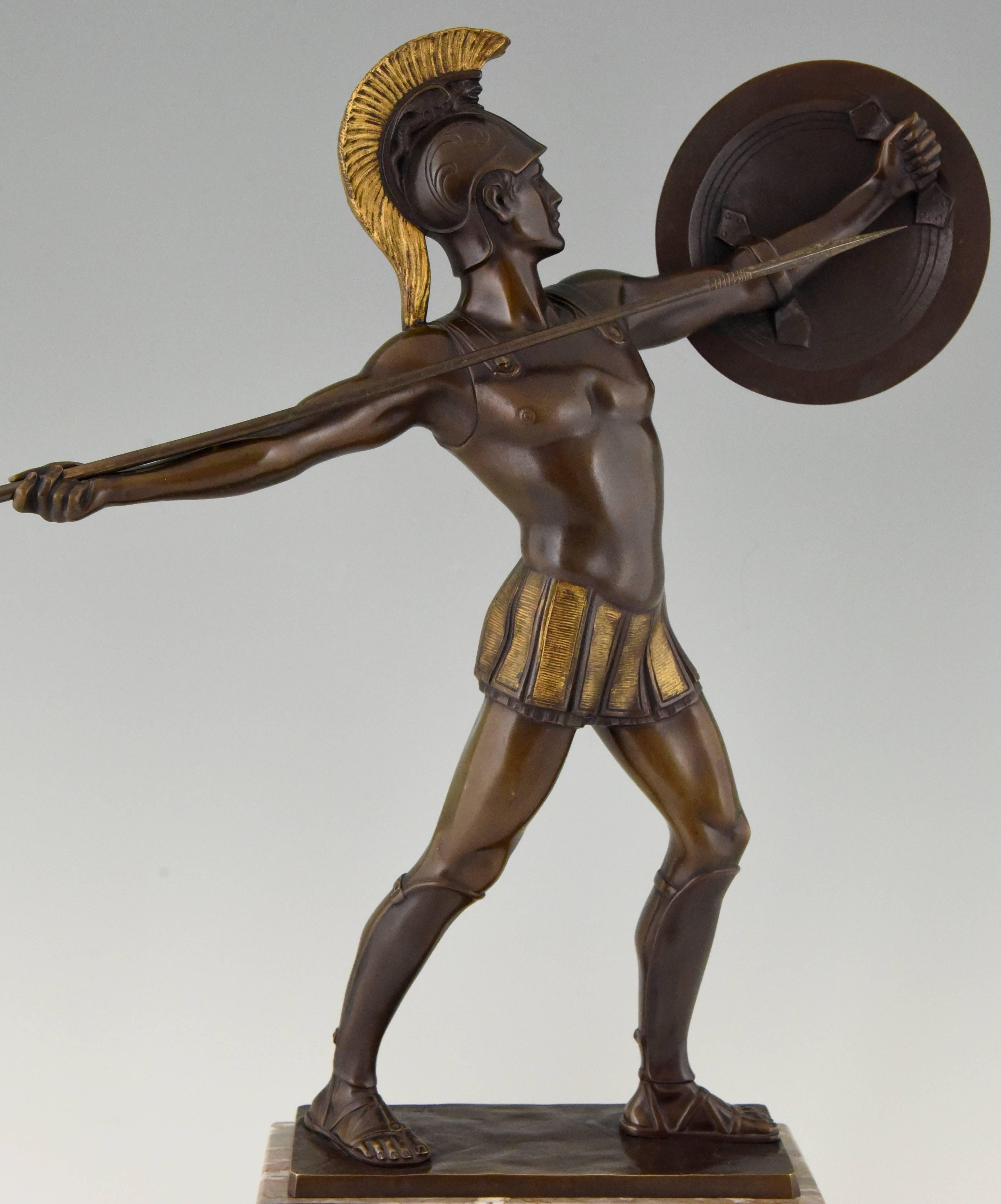 Beautiful bronze sculpture of a Roman warrior with spear and helmet on a marble plinth.

Artist/ maker: H. J. Rieder
Signature/ marks: H. Rieder.
Style: Art Deco.
Date: 1920.
Material: Patinated bronze. Marble base.
Origin: Germany.
Size: H