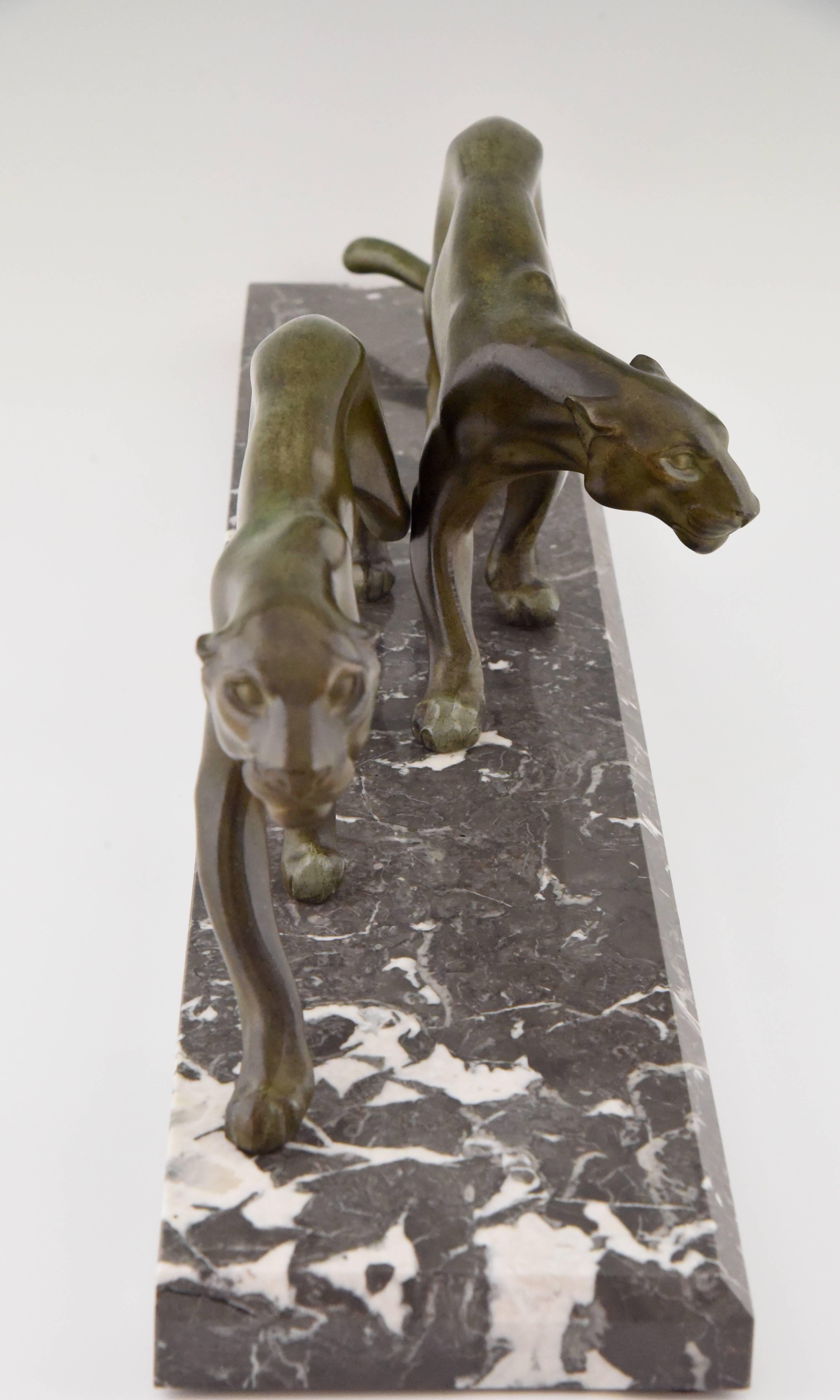 Patinated Art Deco Sculpture of Two Walking Panthers by M. Font France