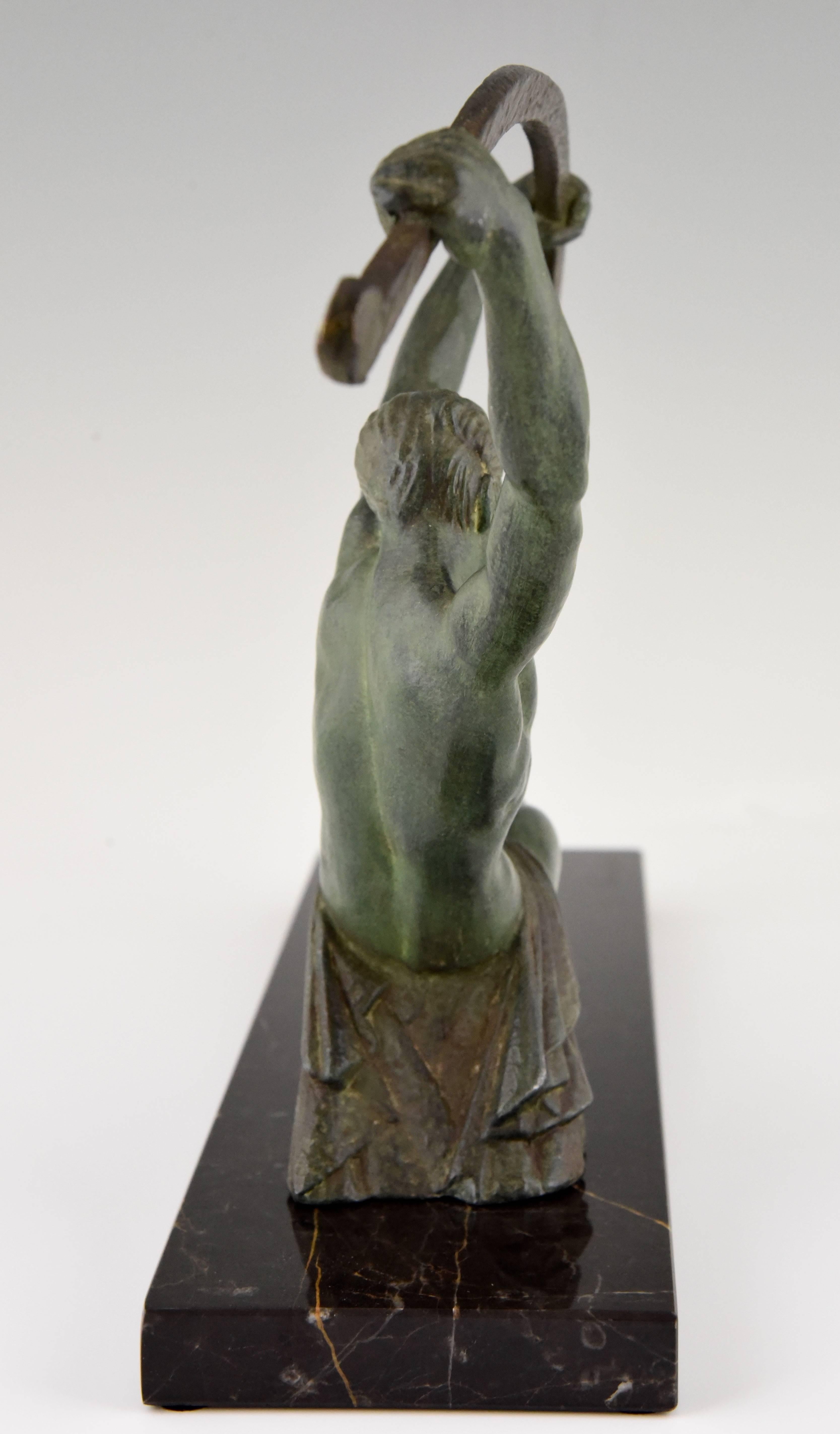 Patinated Art Deco Sculpture by Chiparus, Athletic Man Bending a Bar 