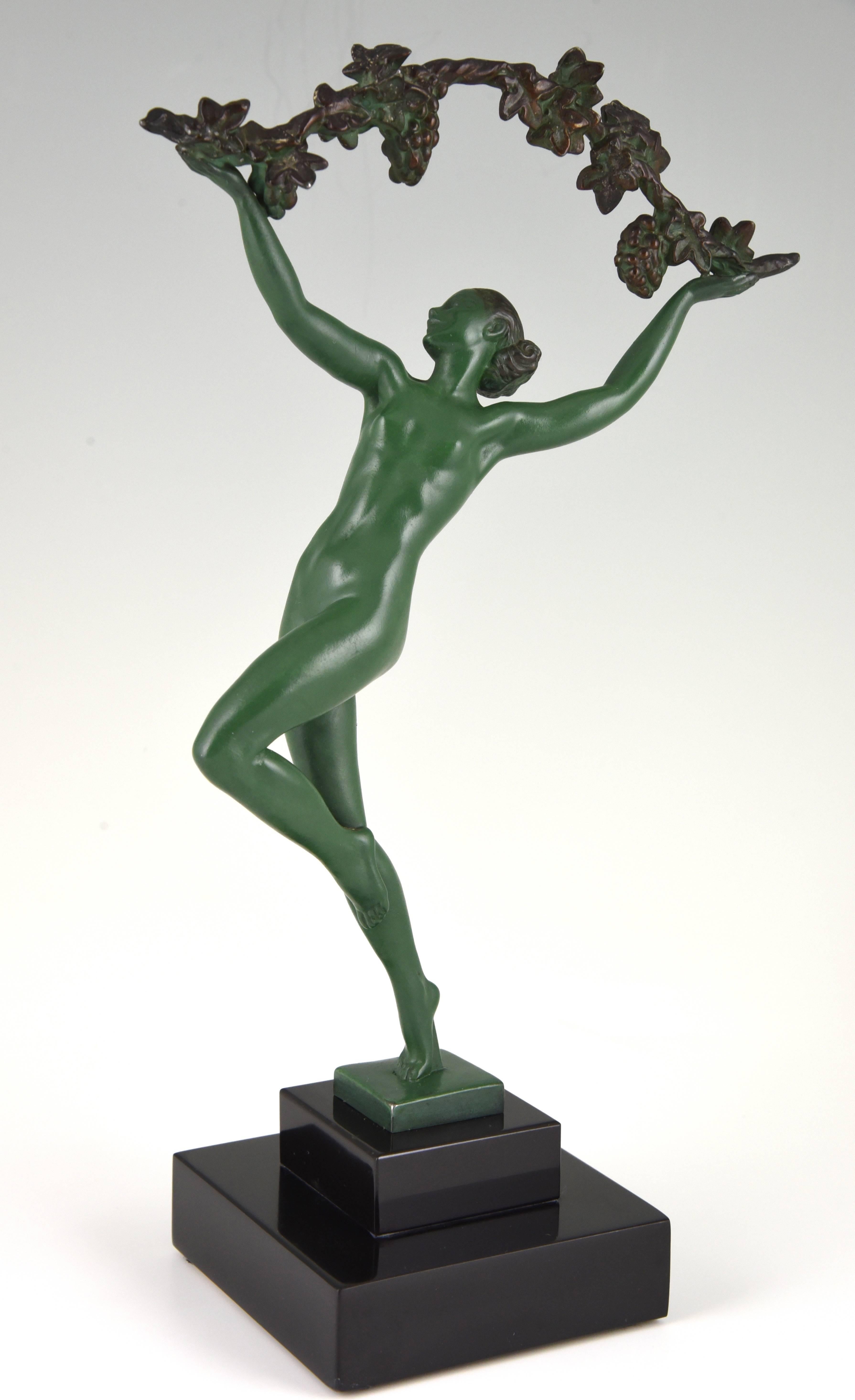 Art Deco sculpture of a nude with a branch of grapes.

Artist/ maker: Raymonde Guerbe.
Signature/ marks: Guerbe. Cast by the Max Le Verrier foundry.
Style: Art Deco
Date: 1925
Material: White metal, light green patina, on a black marble