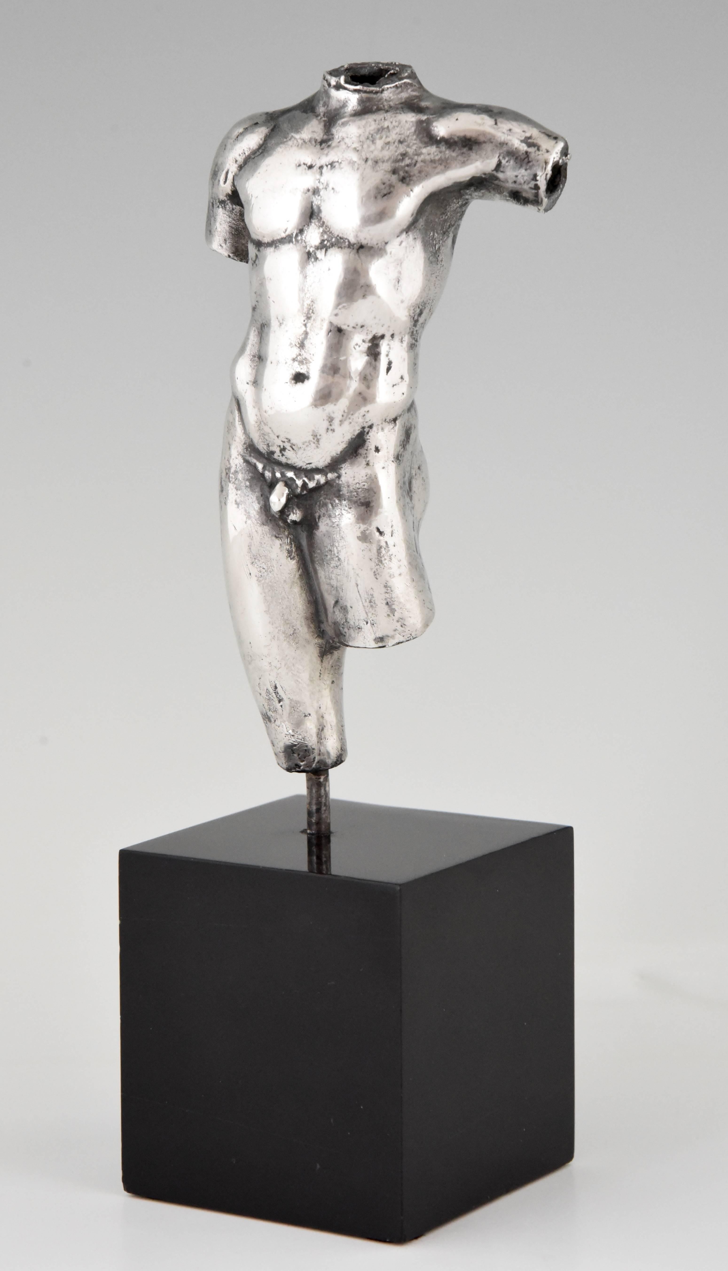 Antique silver sculpture male nude torso,
France, 1900.
Signature/ marks: Silver guarantee mark Minerve? & Makers Mark. ?
Date: 1900
Material: Silver on black marble base.
Origin: France.
Size: H. 23.5 cm. x L. 8 cm. x W. 7 cm.
H. 9.3 inch x