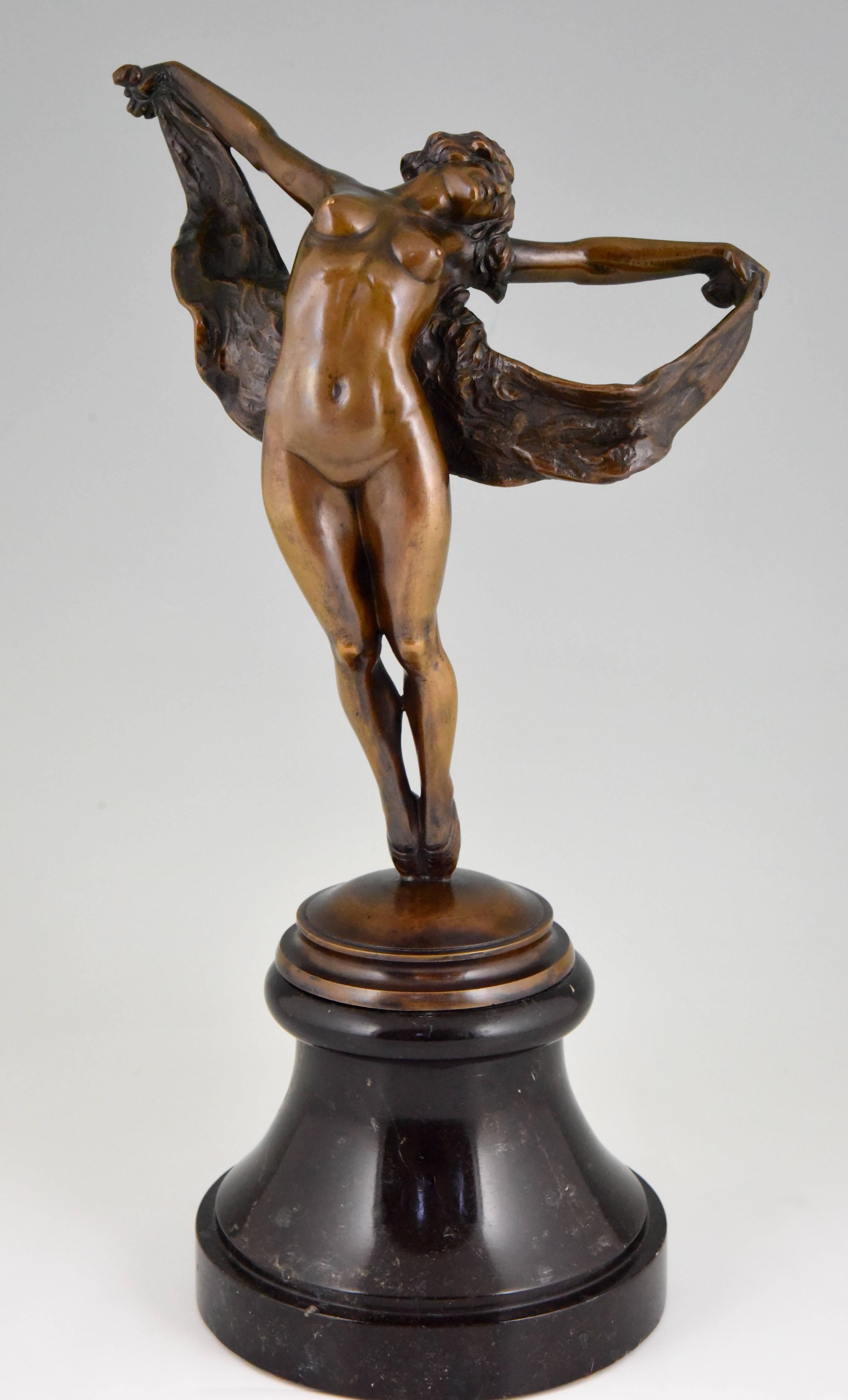 Art Nouveau bronze sculpture of a dancing nude.
Artist/ Maker: Joseph Zomers
Signature/ Marks: J. Zomers
Style: Art Nouveau.
Date: 1915
Material: Patinated bronze. ?Marble base.
Origin: Belgium
Size: H. 43.5 cm x L. 24 cm. x W. 17 cm. ? 
H.