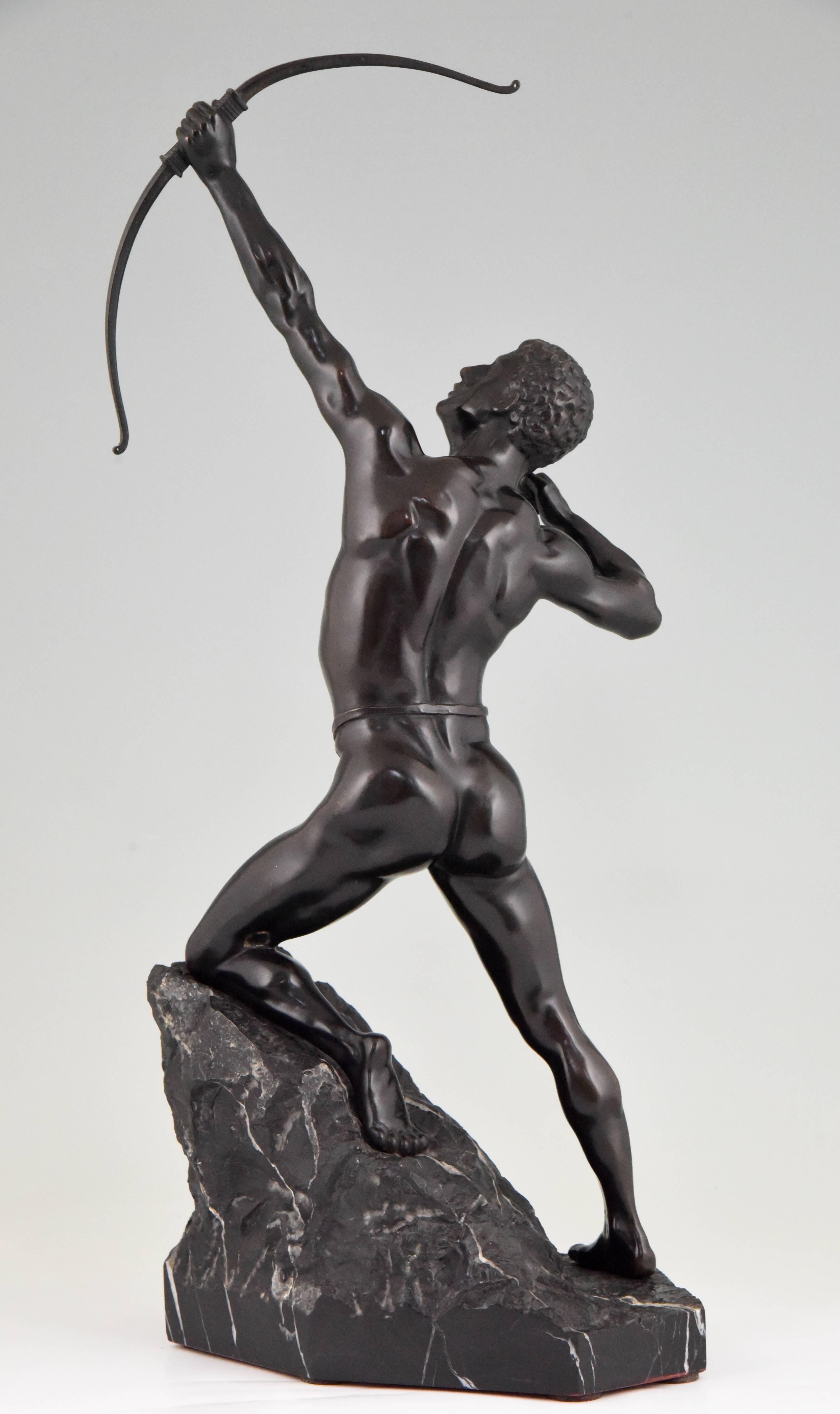 Antique bonze sculpture male nude Archer.
Germany, circa 1900

Material: Bronze, black patina. ?On marble base.
Origin: Germany.
Size: H. 53 cm. x L. 23 cm. x W. 15 cm. ? 
H. 20.9 inch x L. 9 inch x W. 5.9 inch.
Condition: Very good condition.