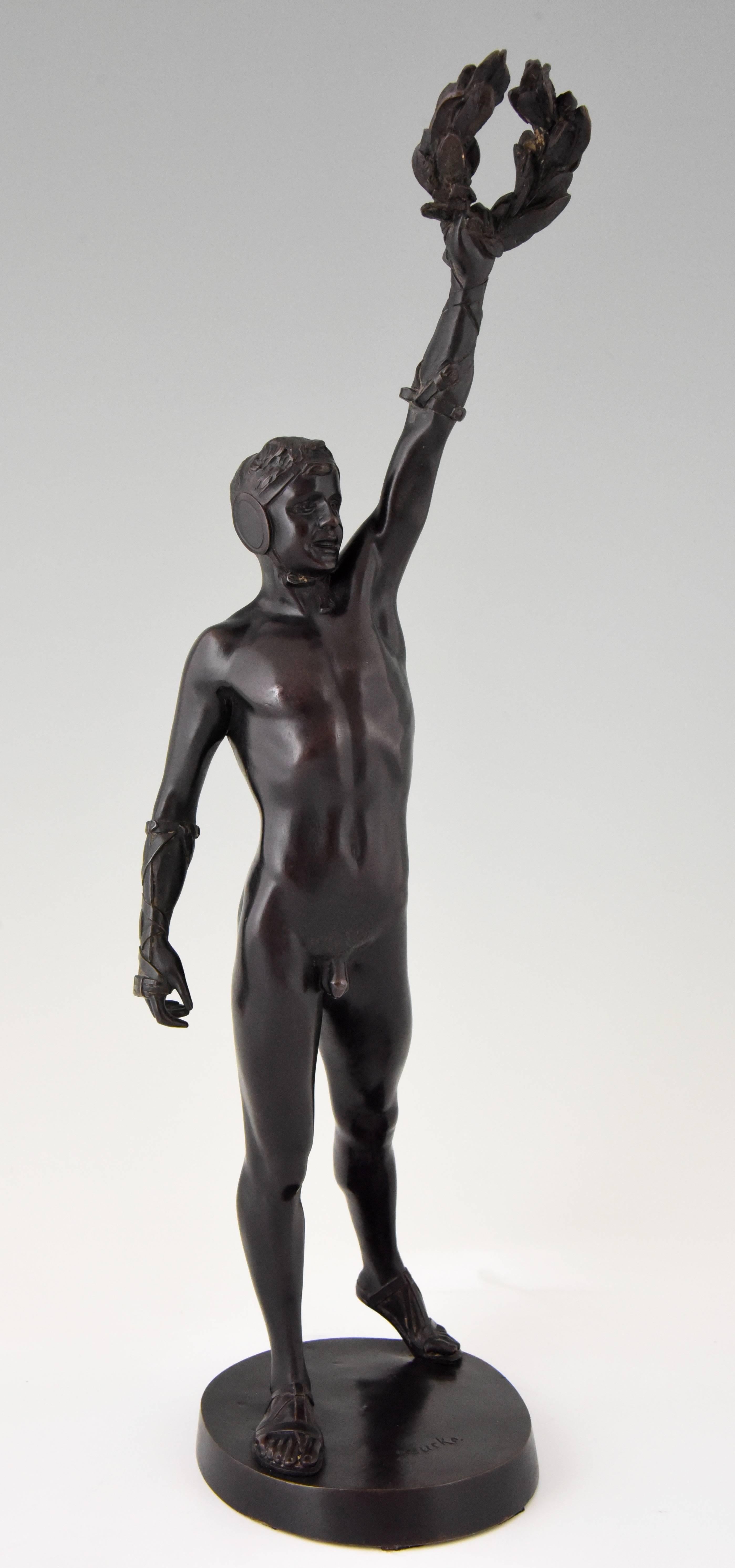 Patinated Antique Bronze Sculpture Male Nude Boxer with Laurel Wreath by Heinrich Baucke