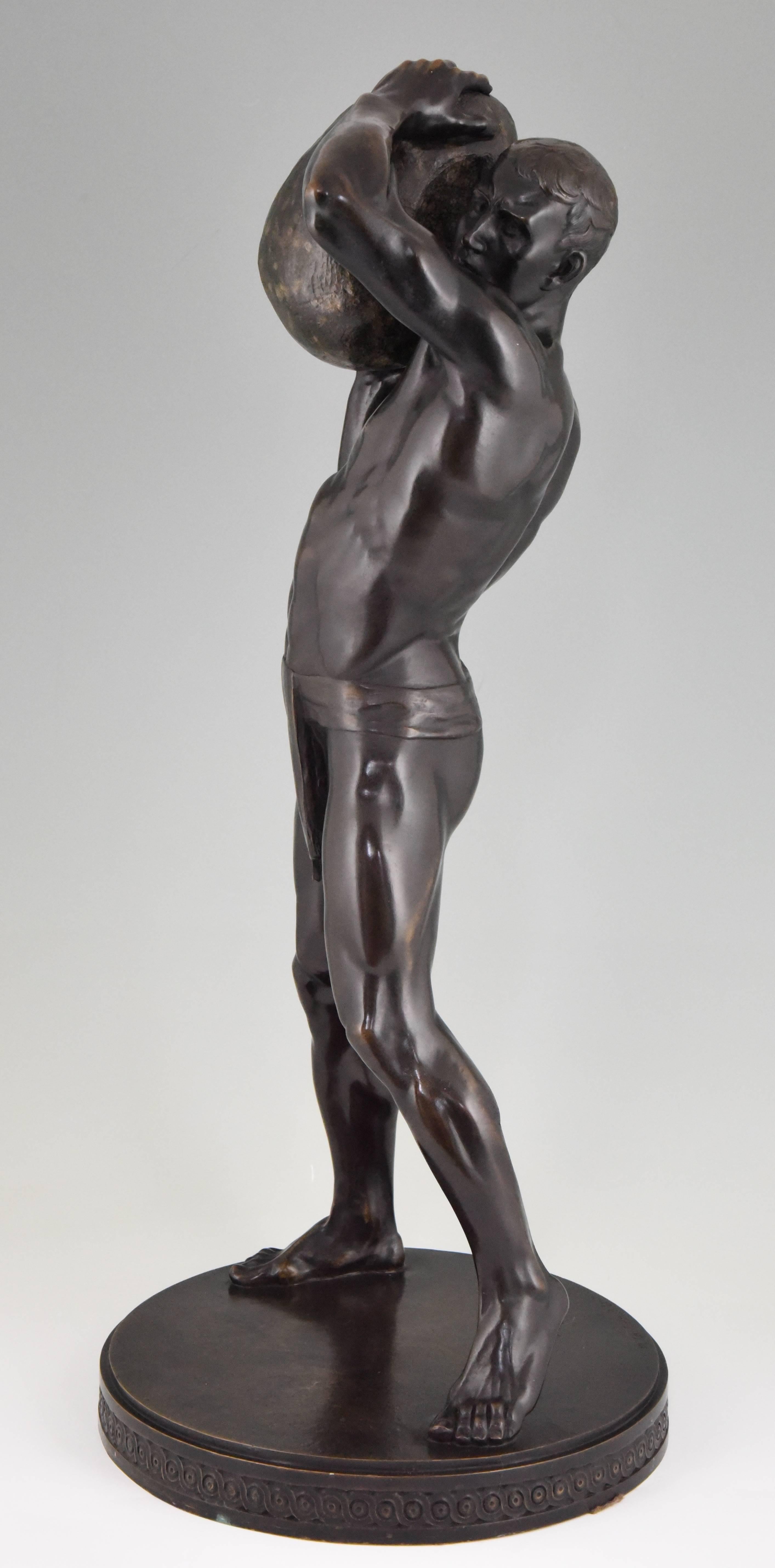 Antique bronze sculpture Of a male nude athlete with Stone.
Signature / Marks: Leibküchler fec., Gladenbeck foundry mark.
Style: Classical.
Date: 1910
Material: Bronze with very dark brown patina. Carved stone.
Origin: Germany.
Size: H 66 cm x