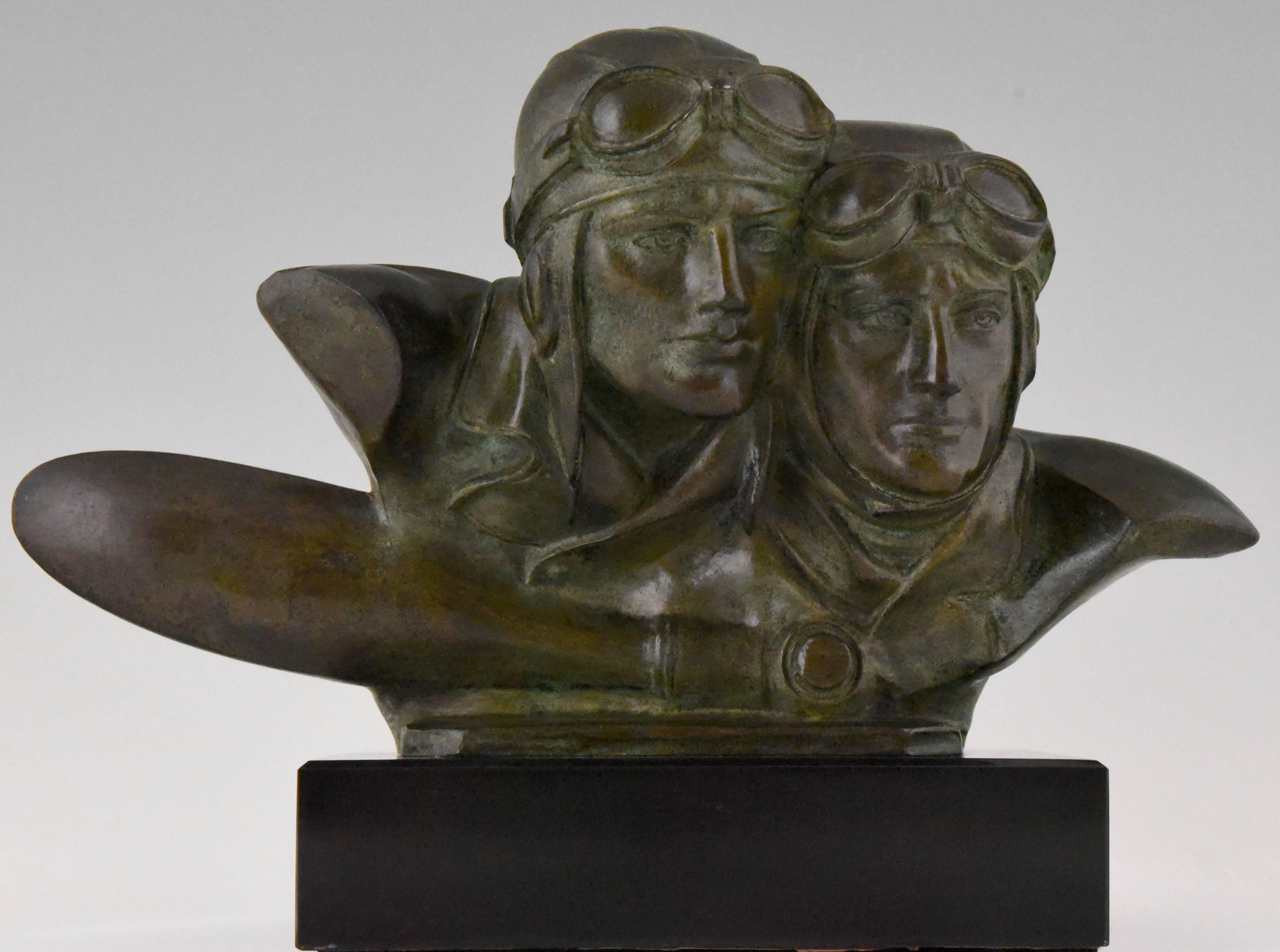 Hard to find Art Deco bronze bust of Costes and Bellonte.
Dieudonne Costes was the pilot and Maurice Bellonte the navigator and radio operator on the first nonstop transatlantic airplane flight from Paris to New York in 1930.
Style: Art