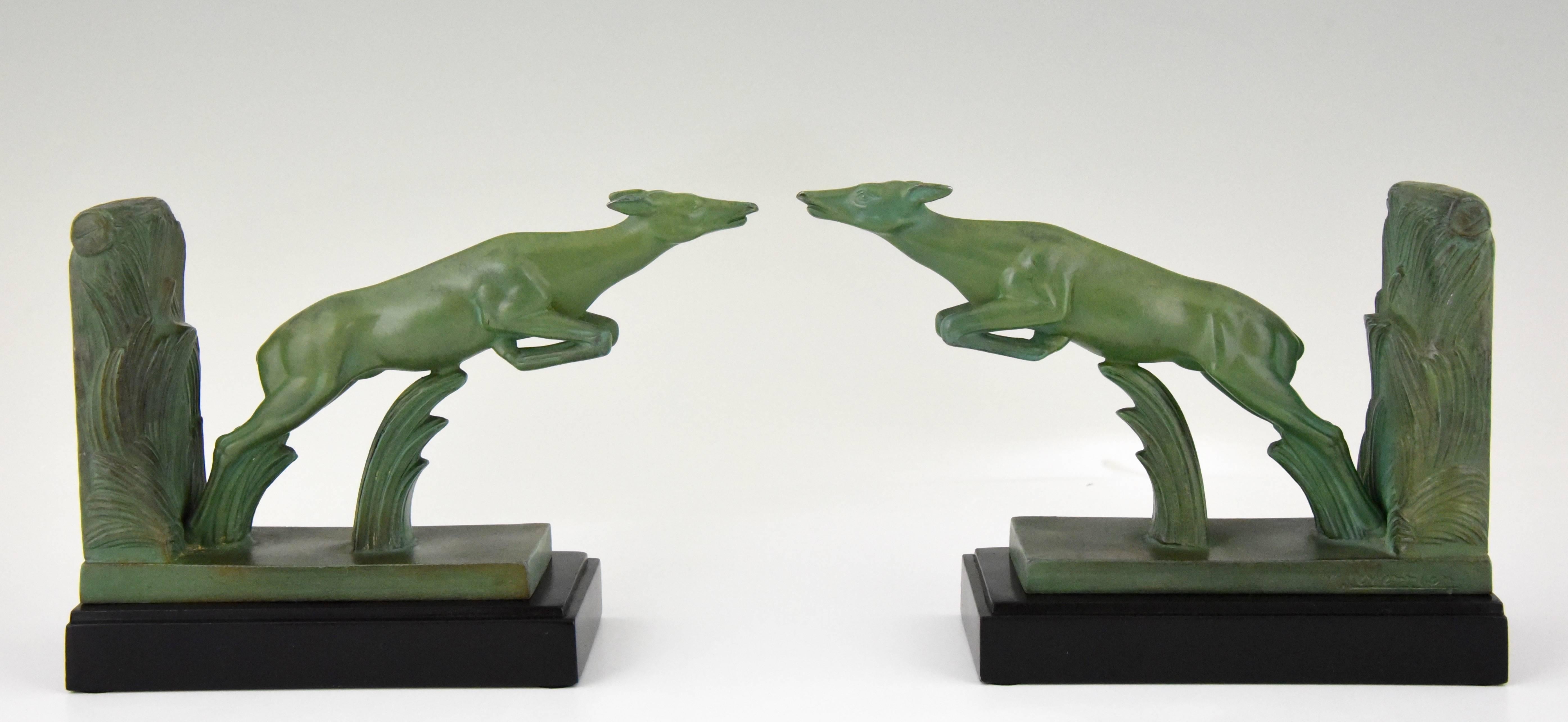 A nice pair of French Art Deco bookends with jumping deer by Max Le Verrier. 
Signature/ Marks: M. Le Verrier
Style: Art Deco
Date: 1930
Material: Patinated metal.
Origin: France.
Size: H. 13 cm. x L. 18 cm. x W. 6.5 cm. ? 
H. 5.1 inch x L.