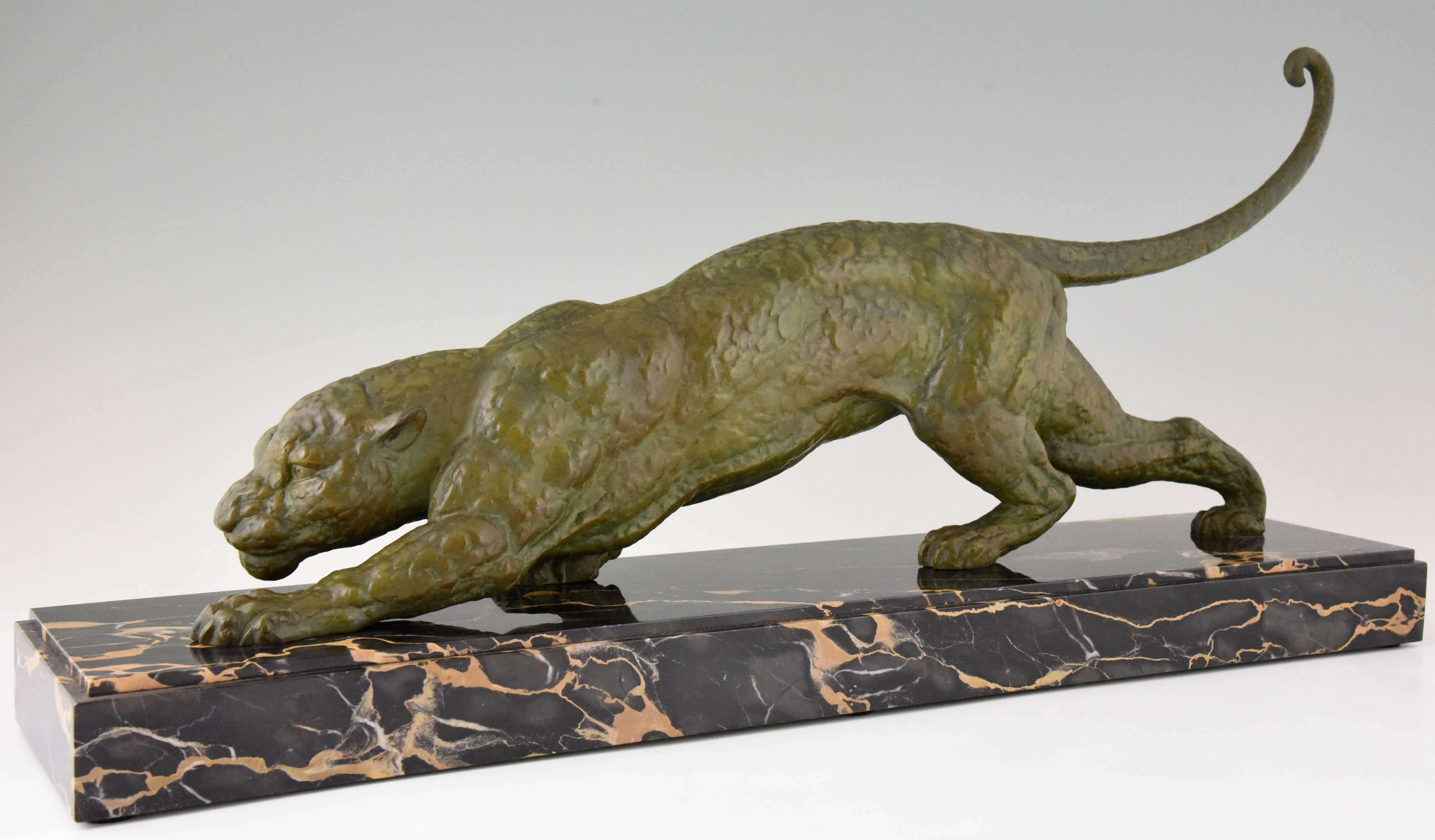Elegant Art Deco sculpture of a panther by the famous Demetre Chiparus on a portor marble base. 
Signature/ Marks: D.H. Chiparus
Style: Art Deco
Date: 1930
Material: Green patinated art metal.?Portor marble base.
Origin: France
Size: H. 36 cm
