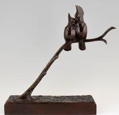Sculpture en bronze Art Déco de deux oiseaux par Raymond de Meester de Betzenbroeck.