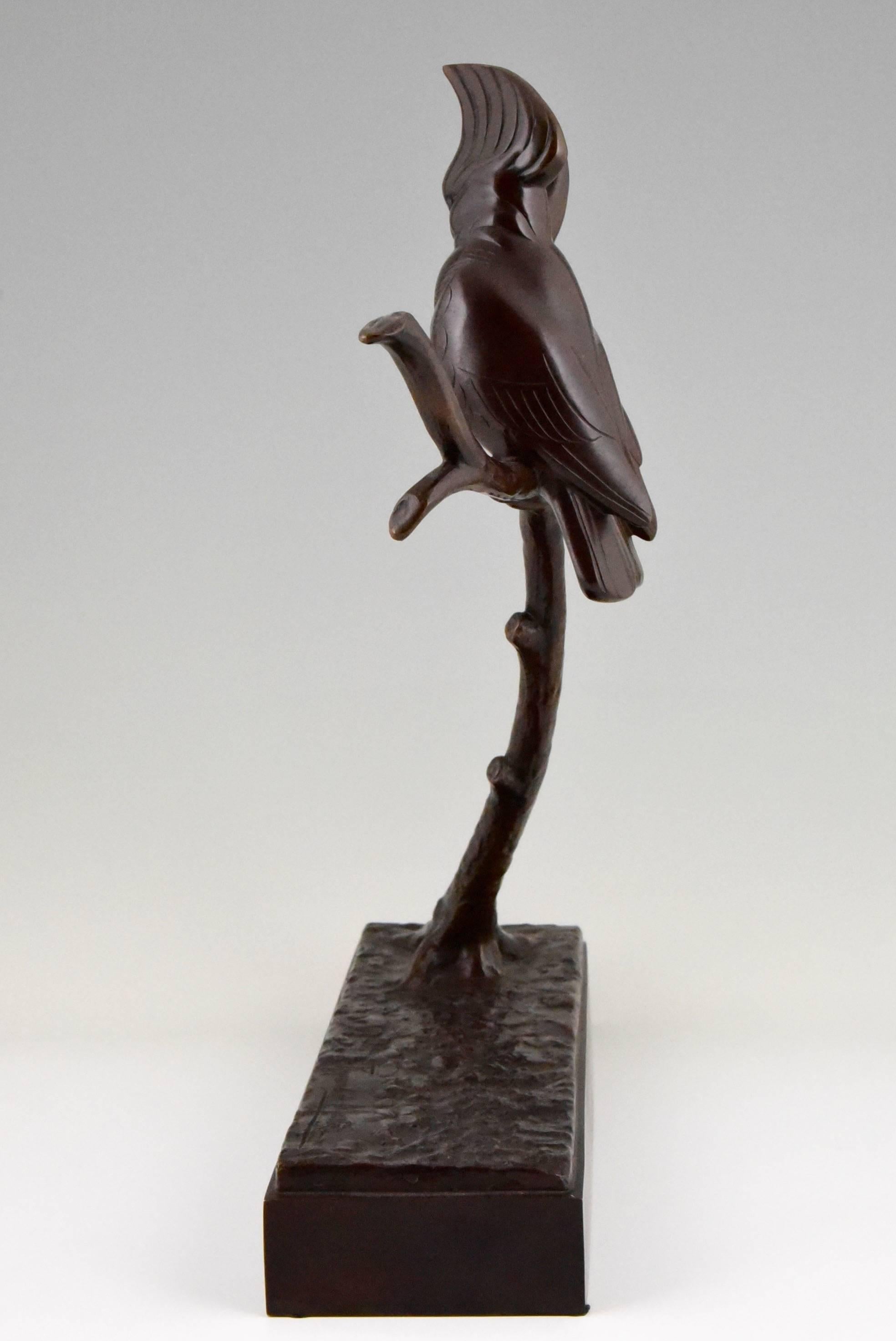 20th Century Art Deco Bronze sculpture of Two Birds by Raymond de Meester de Betzenbroeck.