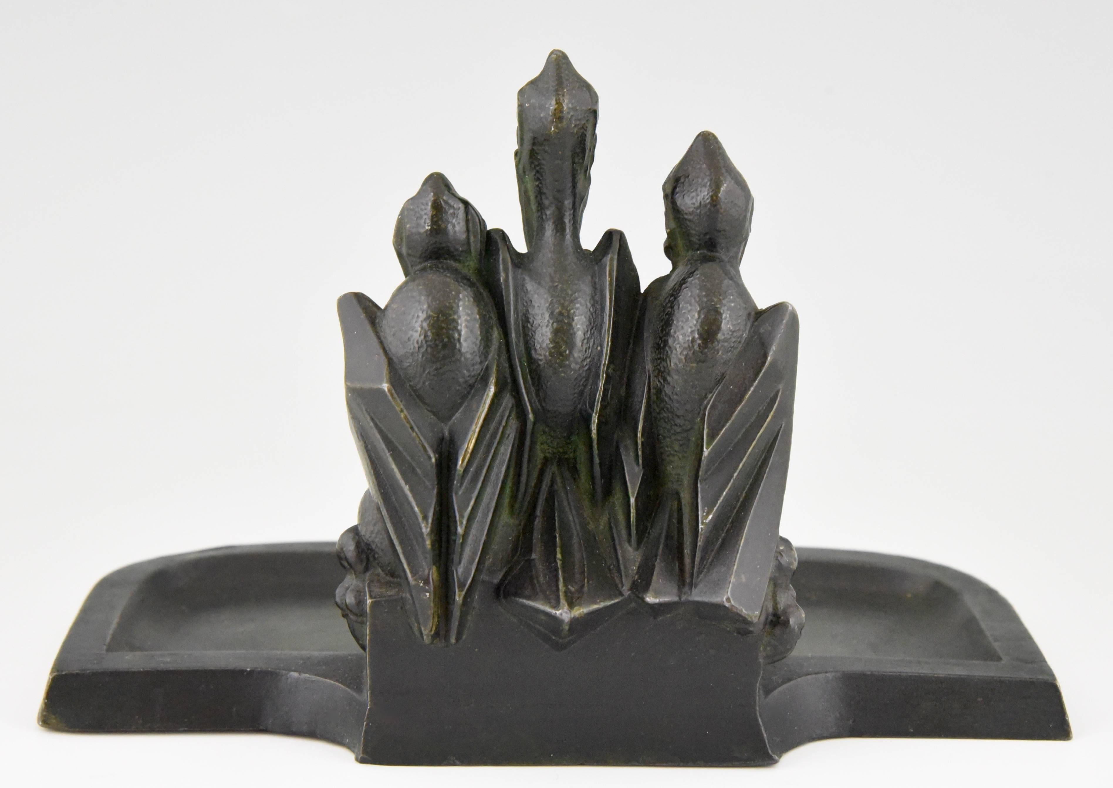 Patinated Art Deco pen tray with Three Pelicans Staring at a Frog by Artus 1930 France