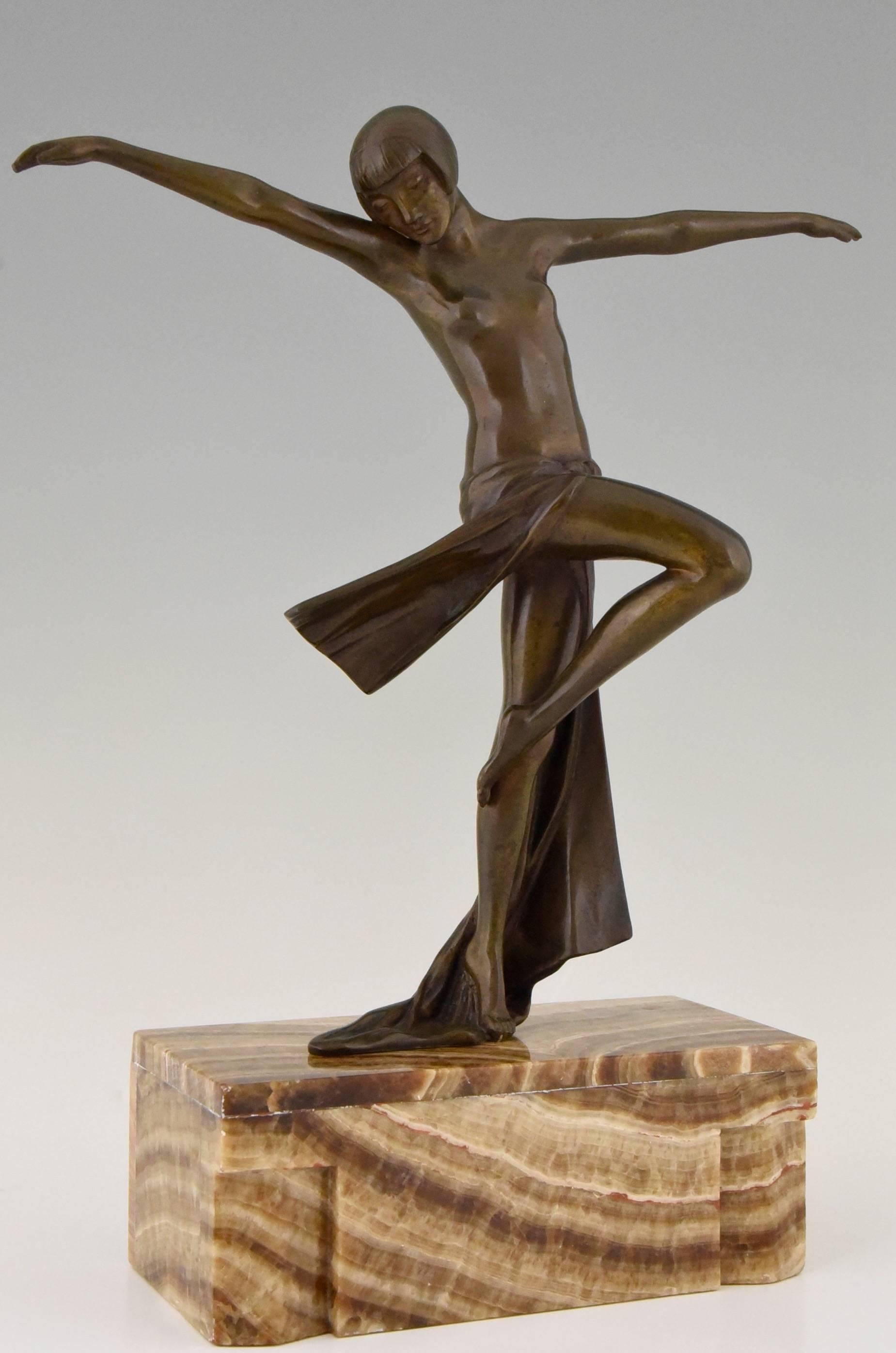 An elegant Art Deco dancing lady on marble base.
By Claire Jeanne Roberte Colinet,
Signature or marks:  Colinet.

Size:  
H. 15 inch x L. 11.8 inch x W. 4.3 inch.
H. 38 cm x L. 30 cm. x W. 11 cm. 

Literature about the artist: 
“Art Deco
