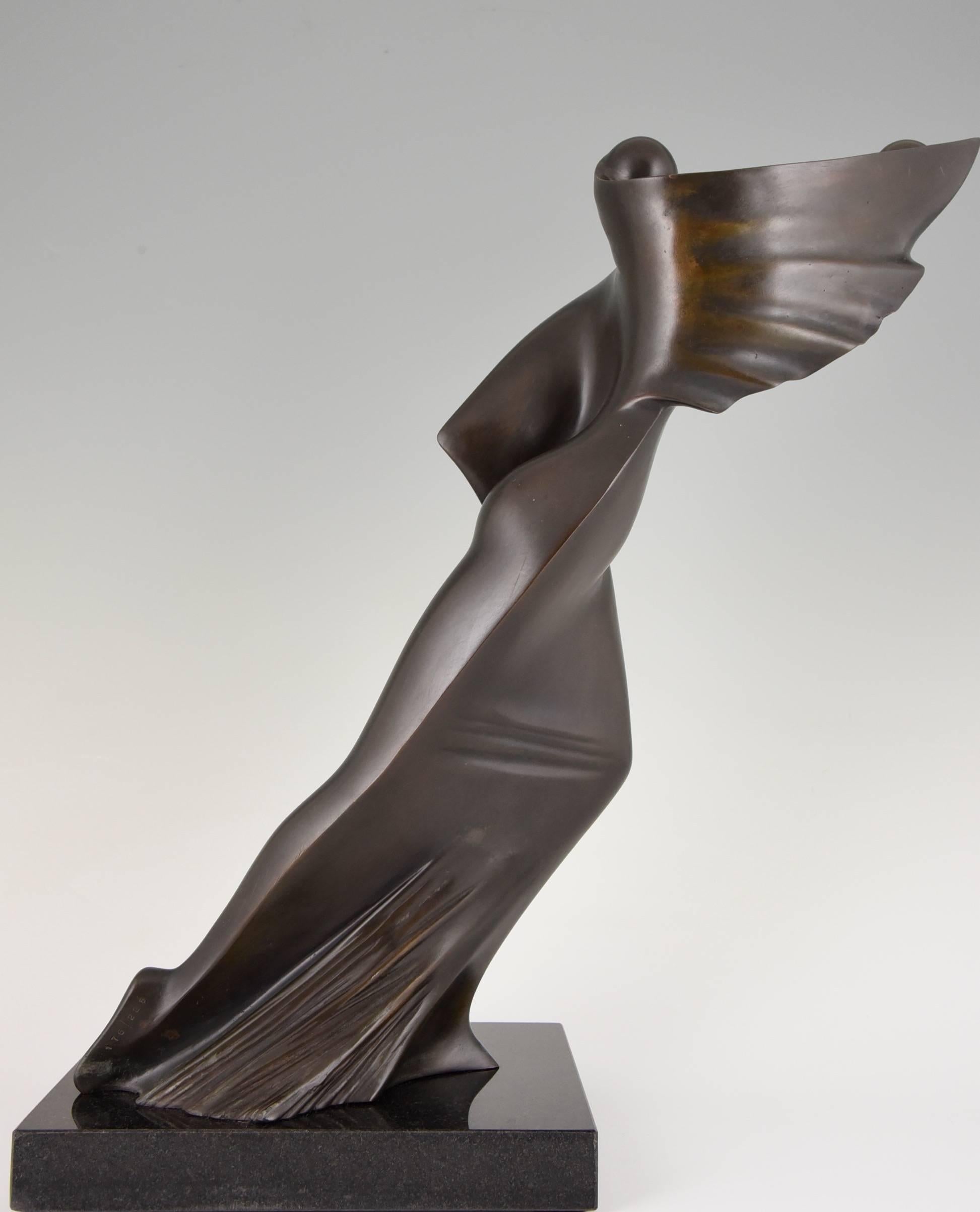 Description:  Modern bronze sculpture of a woman. 
Artist / Maker:  Jean Pierre Baldini (born in France 1949)
Signature / Marks: Baldini 176/225  Arte  Foundry mark. 
Style:  Contemporary. 		
Date:  Ca. 1990
Material: Bronze, patinated. Marble